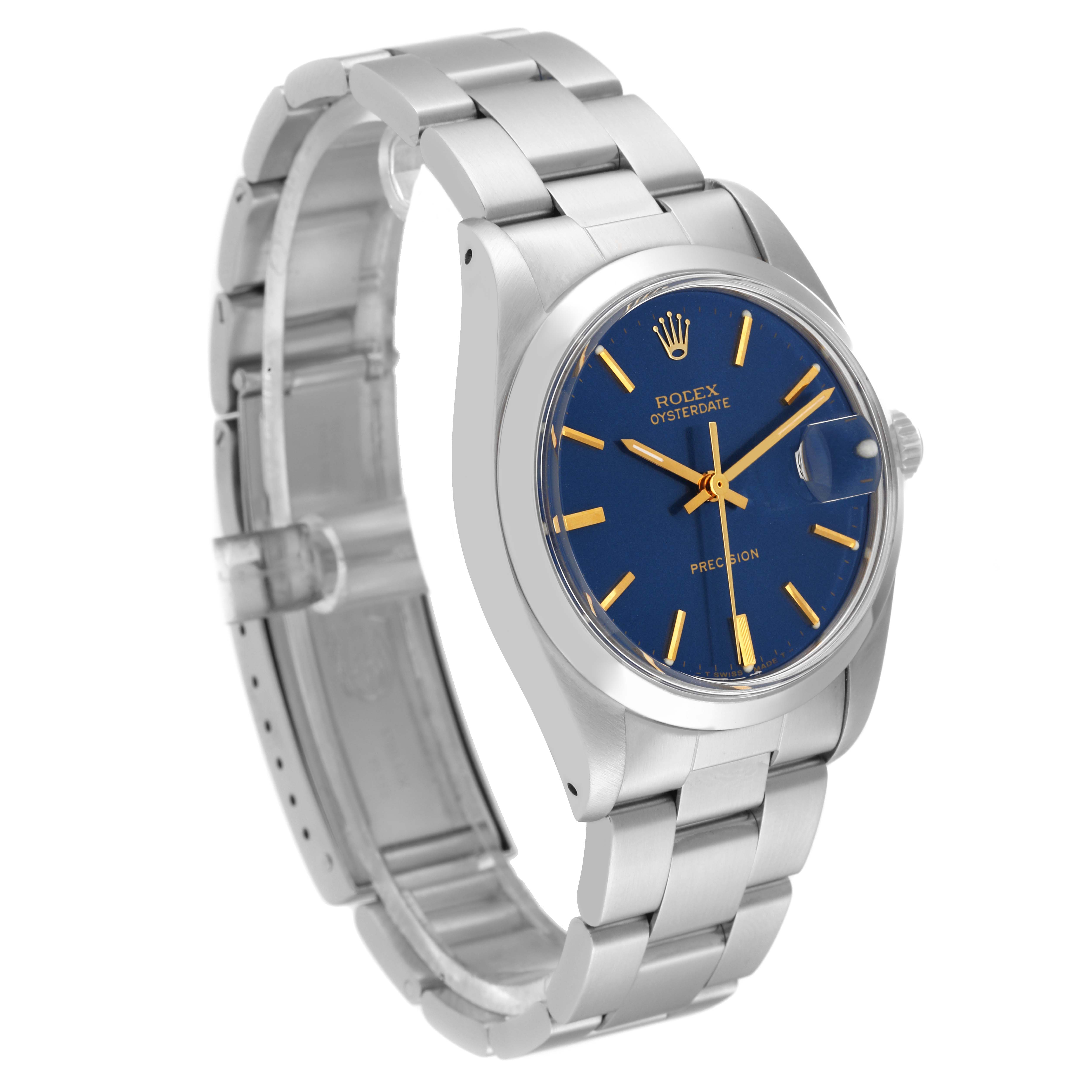 This image shows a side angle of the Rolex Vintage Collection 6694 Men's Stainless Steel Blue Dial 6694 Men's Stainless Steel Blue Dial watch, highlighting its blue dial, silver bracelet, and gold markers.
