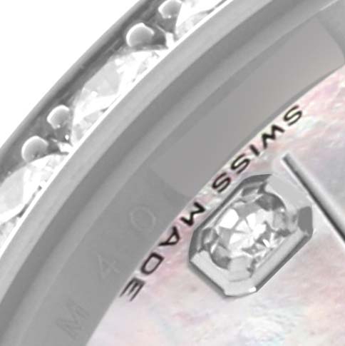 The image shows a close-up of the Rolex Pearlmaster 80299 Women
s White Gold Mother of Pearl Dial 80299 Women
s White Gold Mother of Pearl Dial
s bezel and dial with diamond accents and "Swiss Made" text.