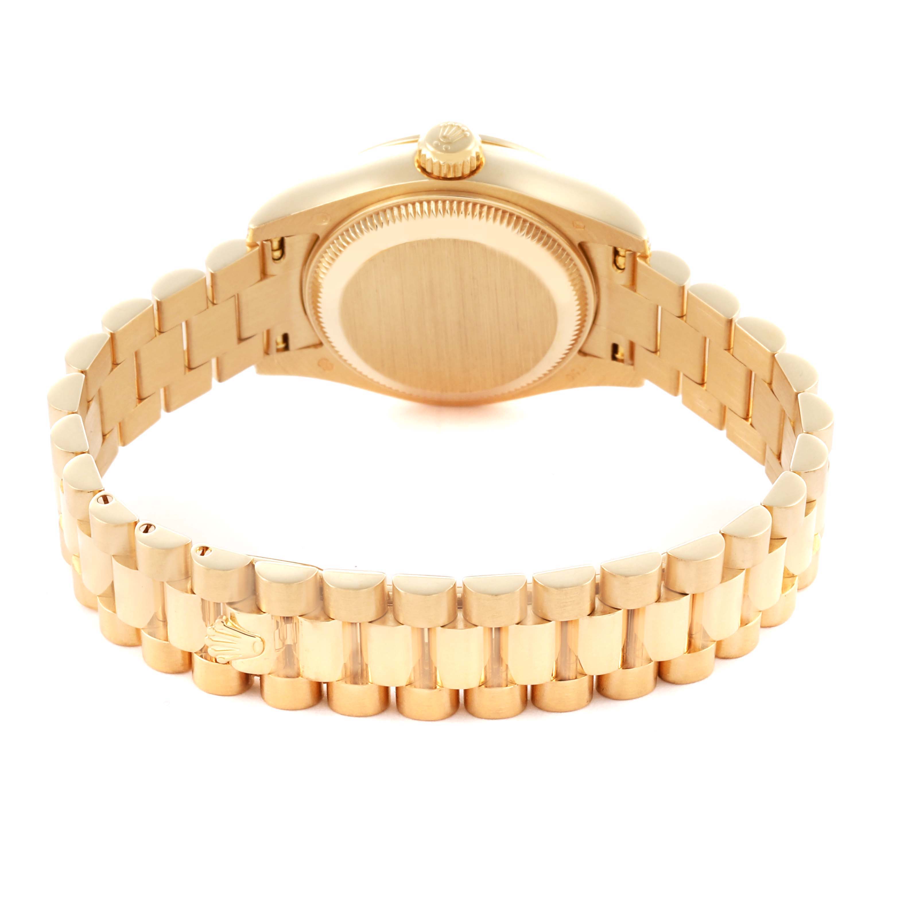 The photo shows a Rolex President 179158 Women's Yellow Gold Champagne Dial 179158 Women's Yellow Gold Champagne Dial watch from the back, highlighting the bracelet and case back.