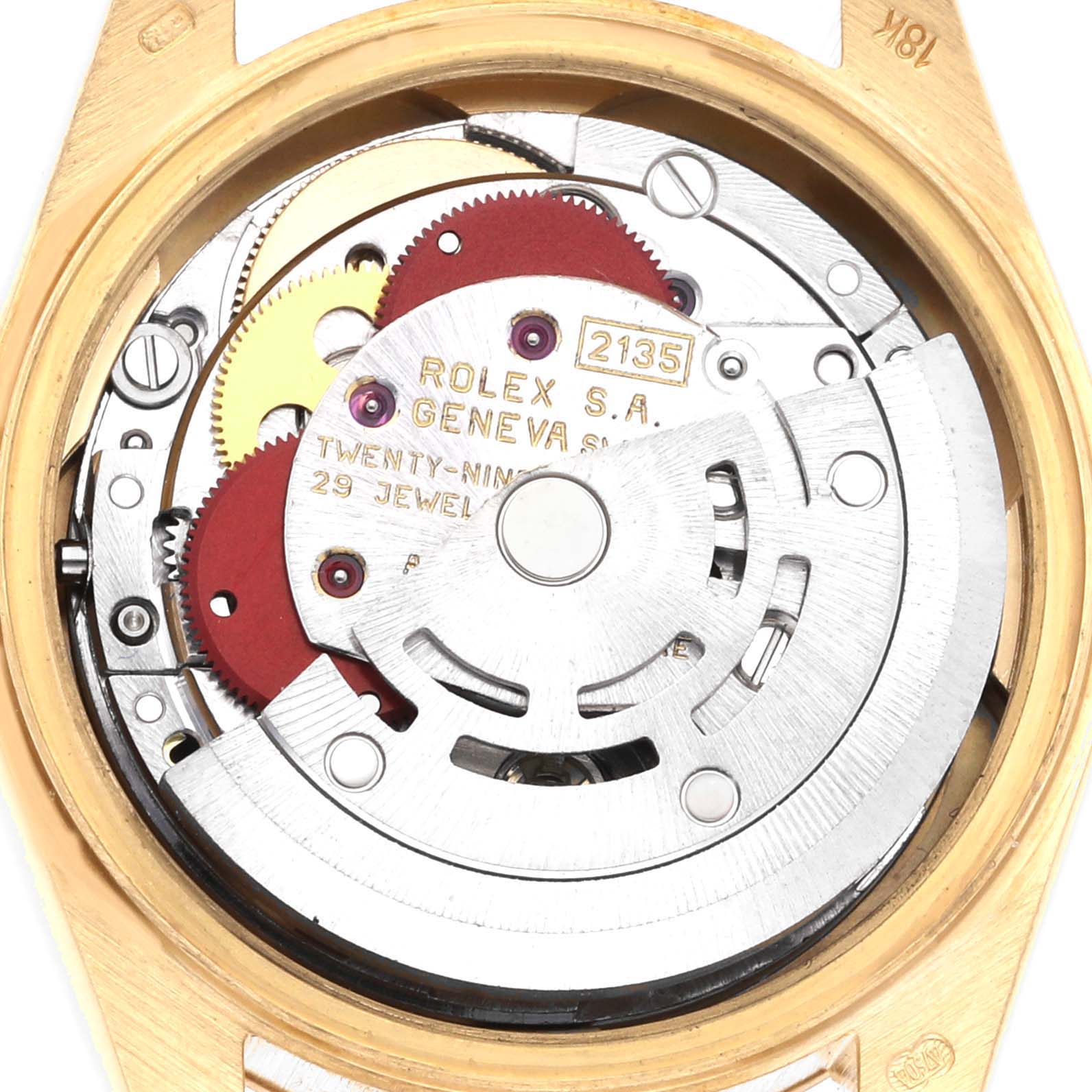 The image shows the movement mechanism of a Rolex President 69178 Women's Yellow Gold Champagne Dial 69178 Women's Yellow Gold Champagne Dial watch, highlighting gears and jewels from the back view.