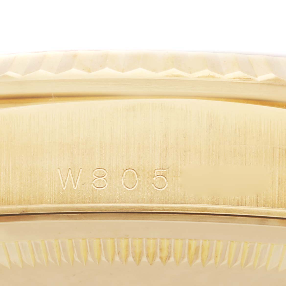 The image shows a close-up side view of the case with serial engraving on the Rolex President 18238 Men's Yellow Gold Champagne Dial 18238 Men's Yellow Gold Champagne Dial watch.