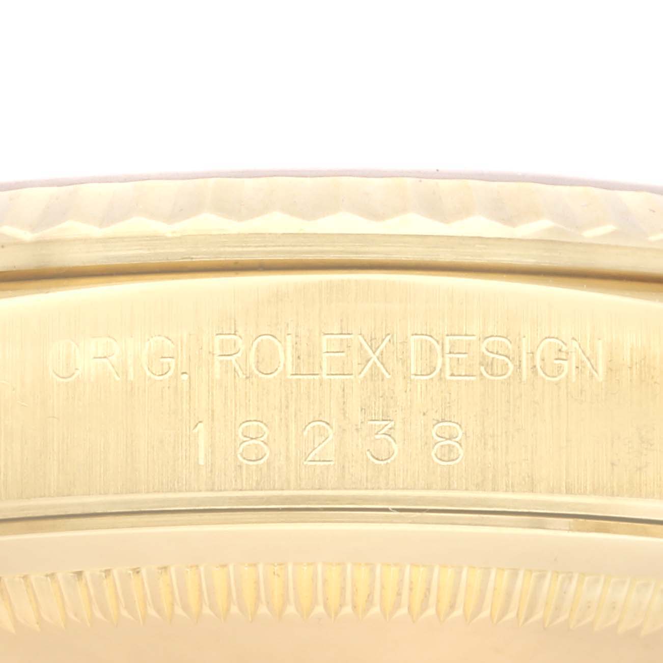 The image shows the engraved side of the Rolex President 18238 Men's Yellow Gold Champagne Dial 18238 Men's Yellow Gold Champagne Dial model, highlighting "Orig. Rolex Design" and the model number.