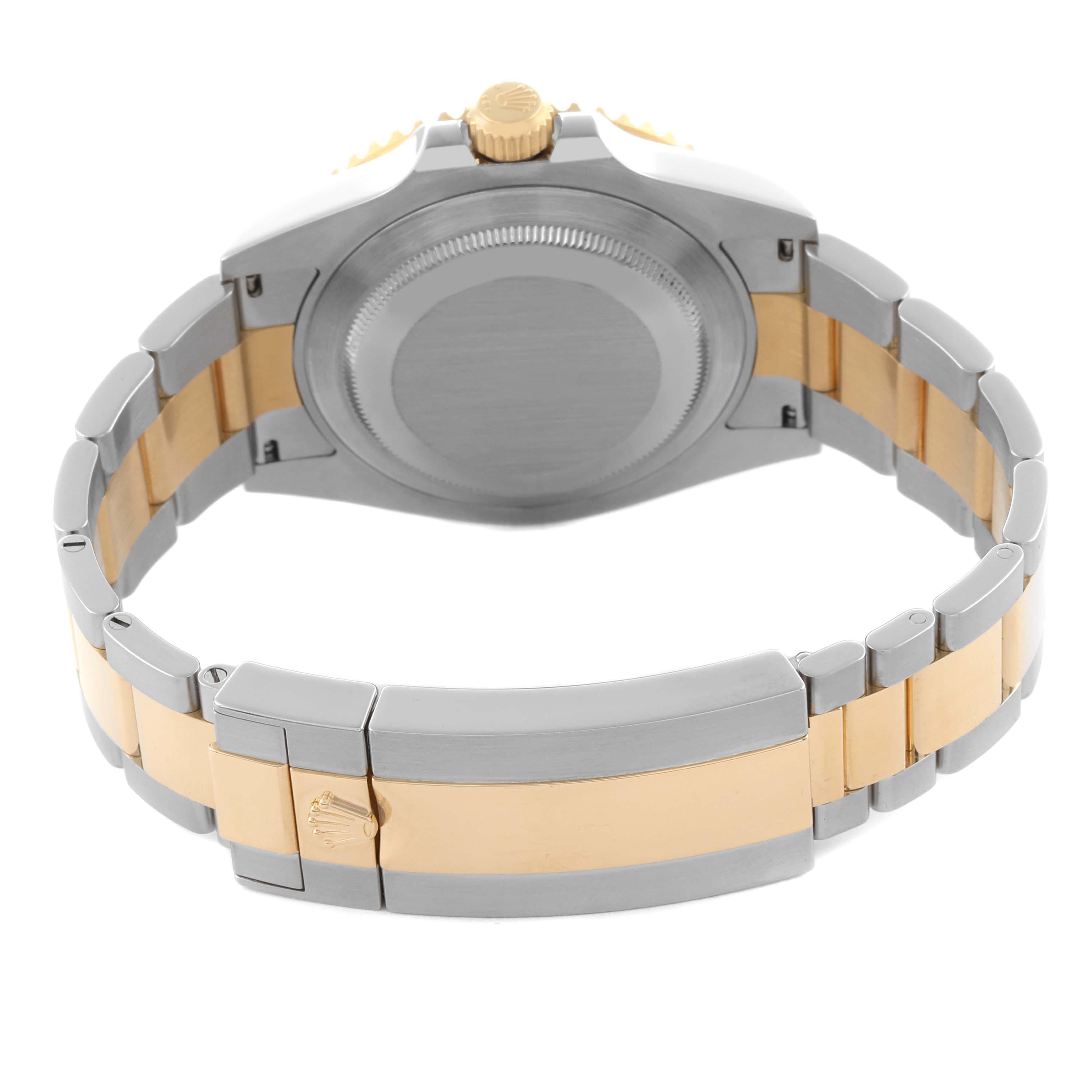 The image shows the back and bracelet of a Rolex Submariner 126613LB Men's Steel and Gold (two tone) Blue Dial 126613LB Men's Steel and Gold (two tone) Blue Dial, highlighting its two-tone metal design and clasp.