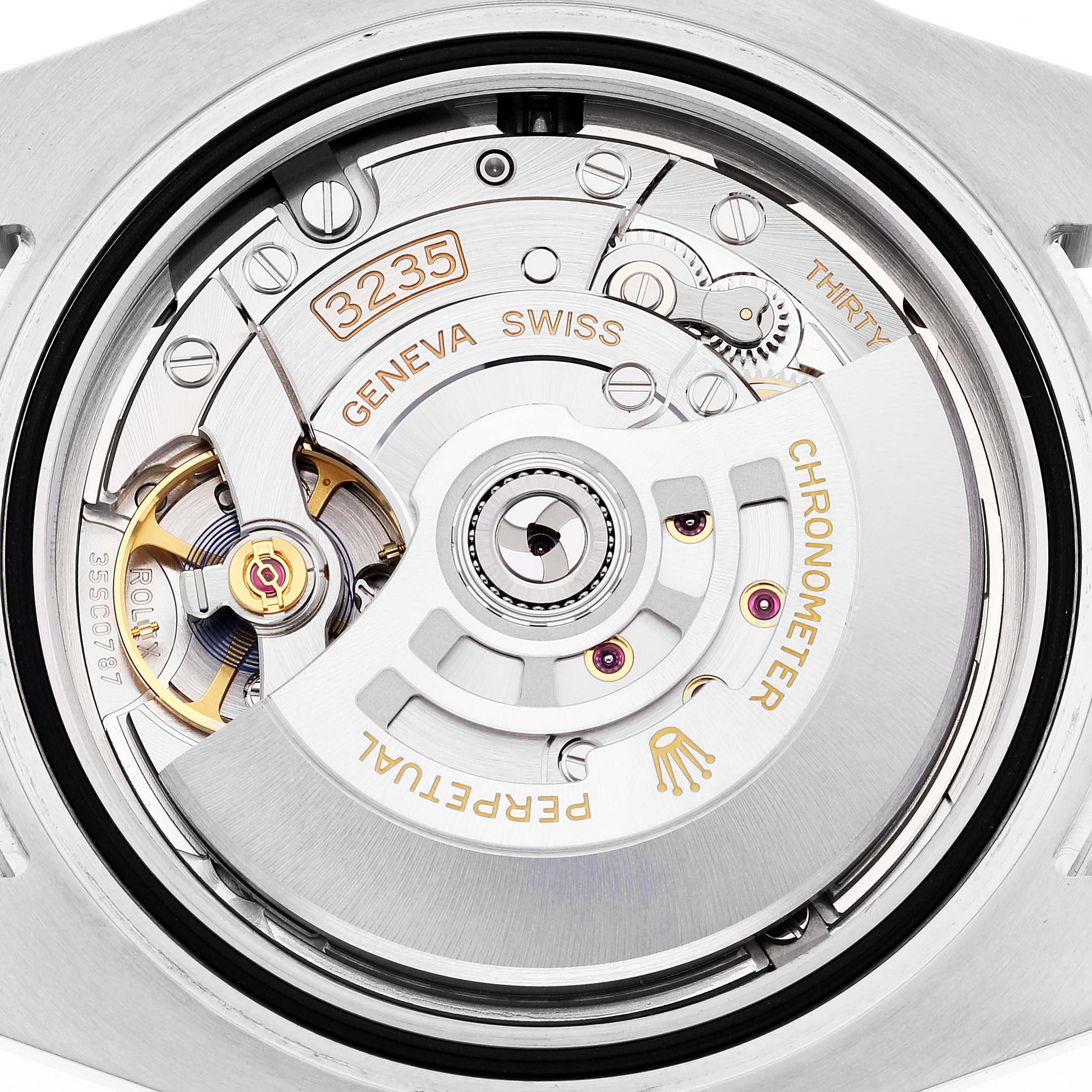 This image shows the internal mechanism of a Rolex Submariner 126610LN Men
s Stainless Steel Black Dial 126610LN Men
s Stainless Steel Black Dial, focused on the movement and rotor parts.