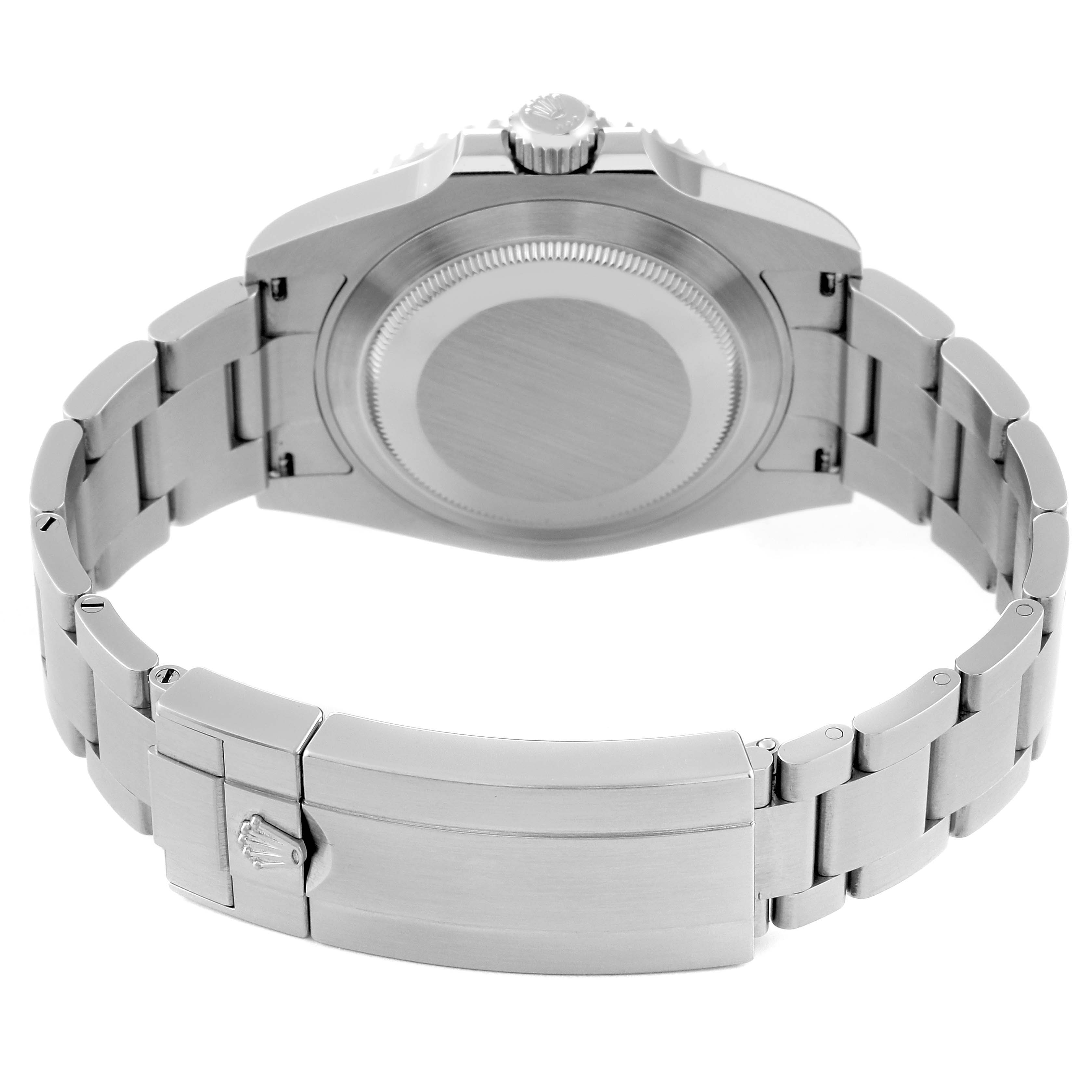 The image shows a Rolex Submariner 126610LN Men
s Stainless Steel Black Dial 126610LN Men
s Stainless Steel Black Dial watch from the back, highlighting the closed case back and the stainless steel bracelet and clasp.