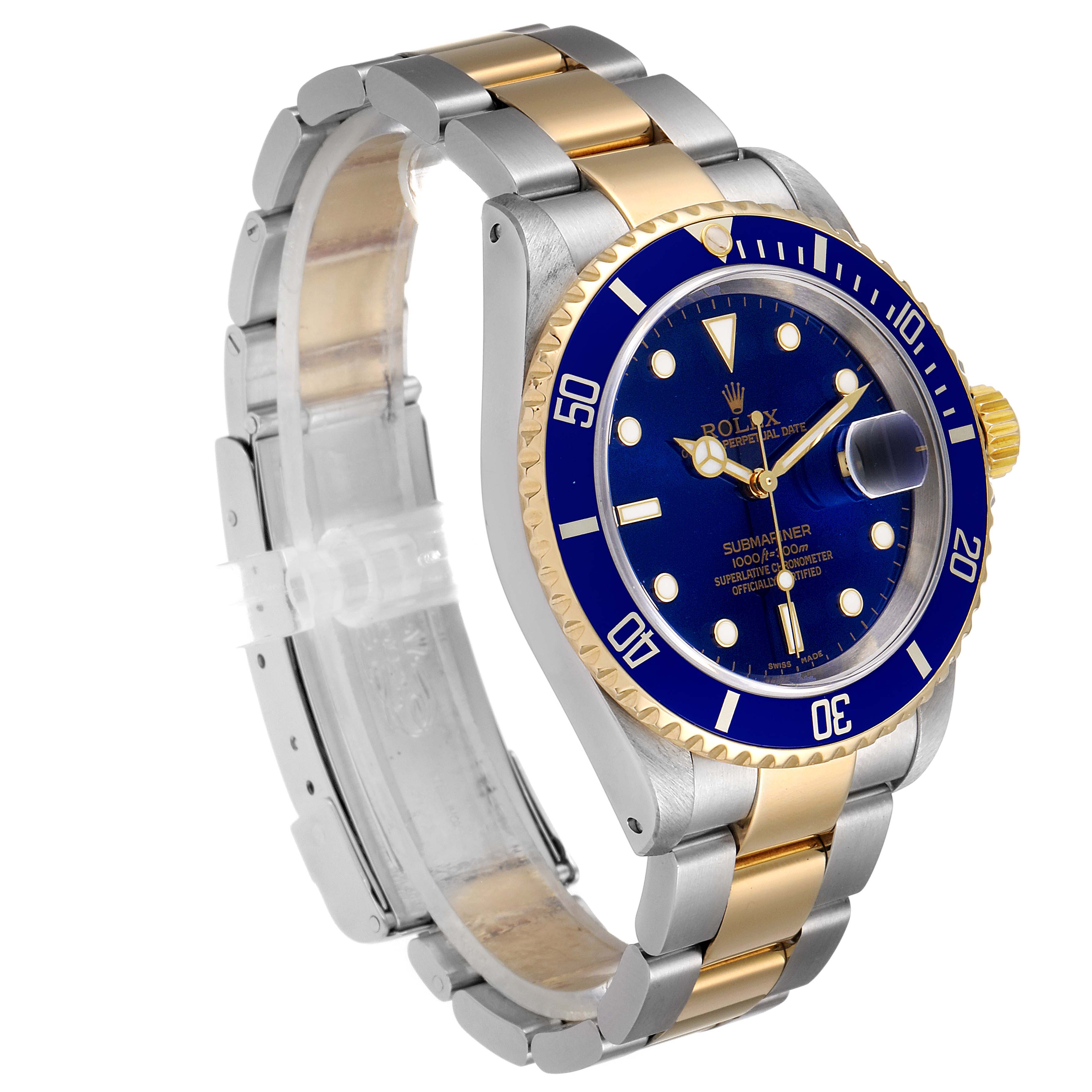 The image shows the Rolex Submariner 16613 Men's Steel and Gold (two tone) Blue Dial 16613 Men's Steel and Gold (two tone) Blue Dial watch from an angled side view, highlighting its blue dial, bezel, and two-tone band.