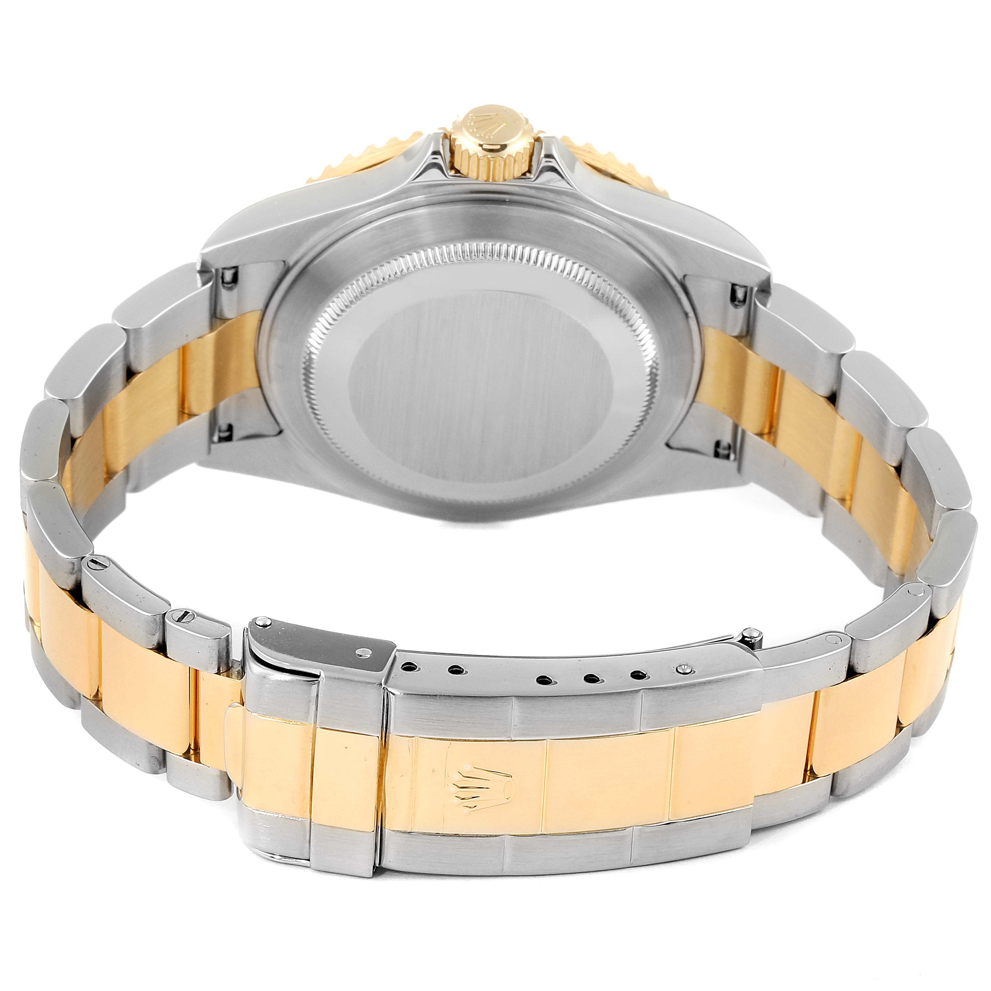 The image shows the back case, crown, and bracelet of a Rolex Submariner 16613 Men's Steel and Gold (two tone) Blue Dial 16613 Men's Steel and Gold (two tone) Blue Dial watch, viewed from the rear.