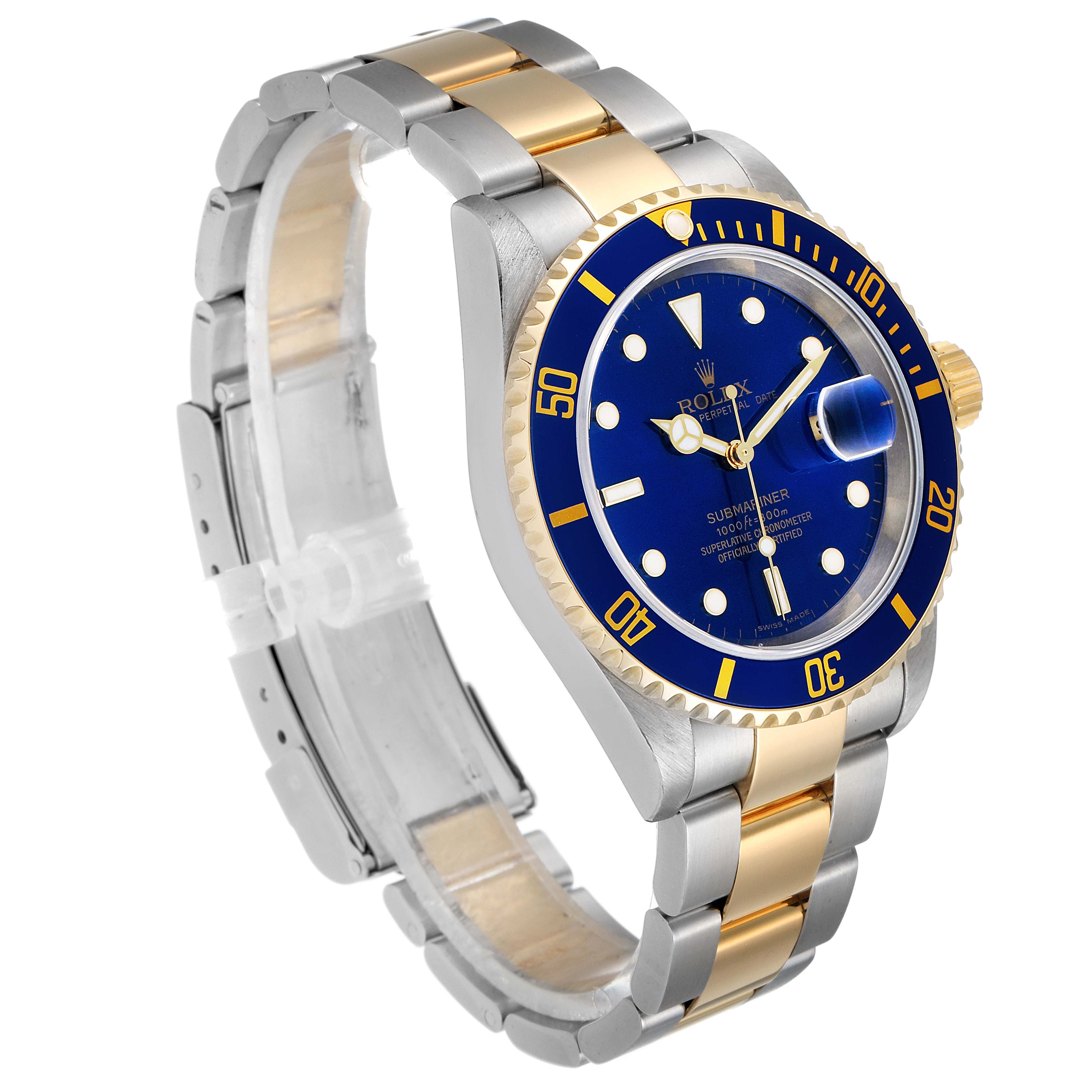 The image shows a Rolex Submariner 16613 Men's Steel and Gold (two tone) Blue Dial 16613 Men's Steel and Gold (two tone) Blue Dial watch at an angled side view, highlighting its blue dial, gold bezel, and two-tone bracelet.
