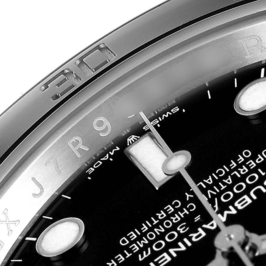 The image shows a close-up of the Rolex Submariner 126610LN Men
s Stainless Steel Black Dial 126610LN Men
s Stainless Steel Black Dial watch dial and part of the bezel with the 
30
 marking.