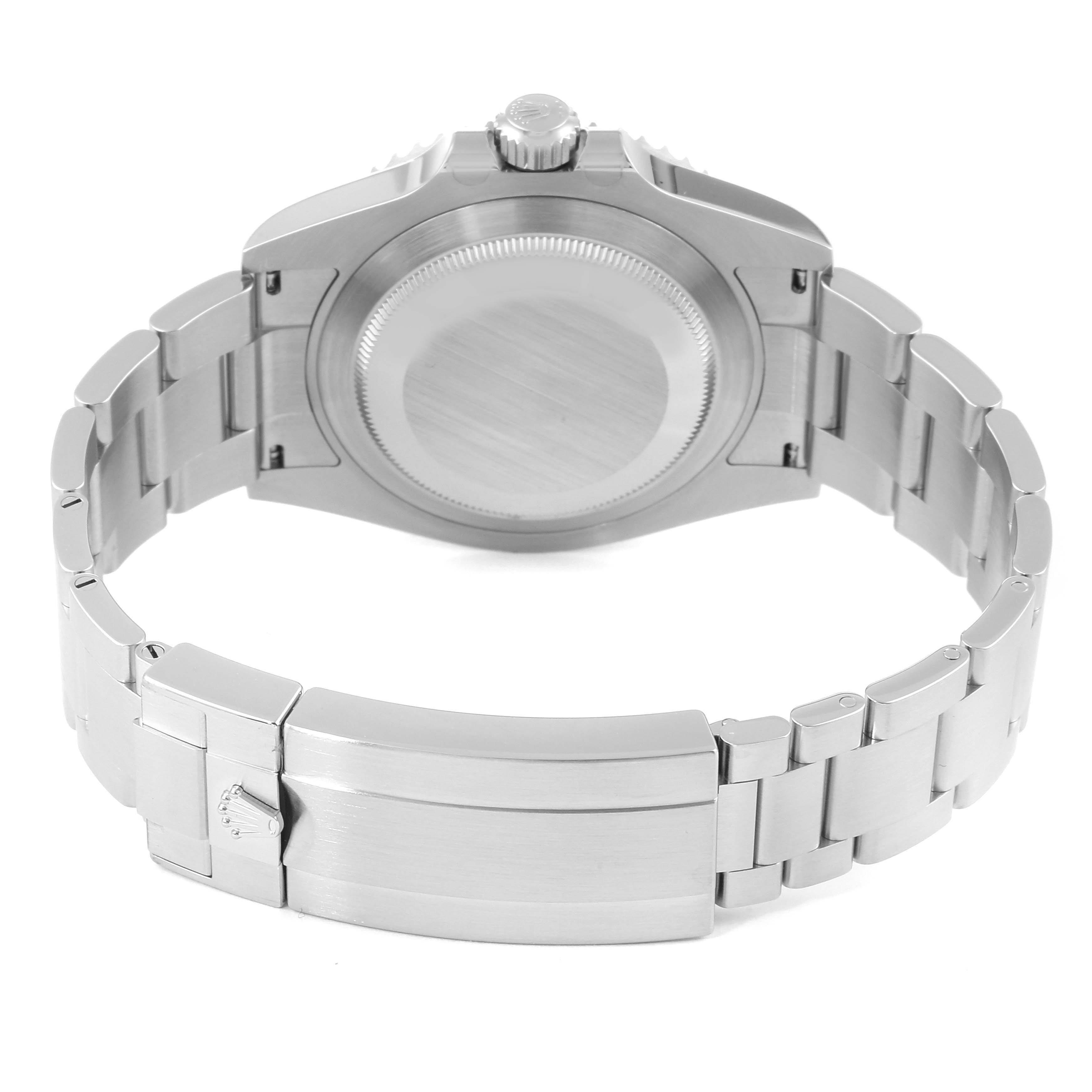 The image shows the back view of a Rolex Submariner 126610LN Men
s Stainless Steel Black Dial 126610LN Men
s Stainless Steel Black Dial watch, focusing on the case back and the stainless steel bracelet and clasp.