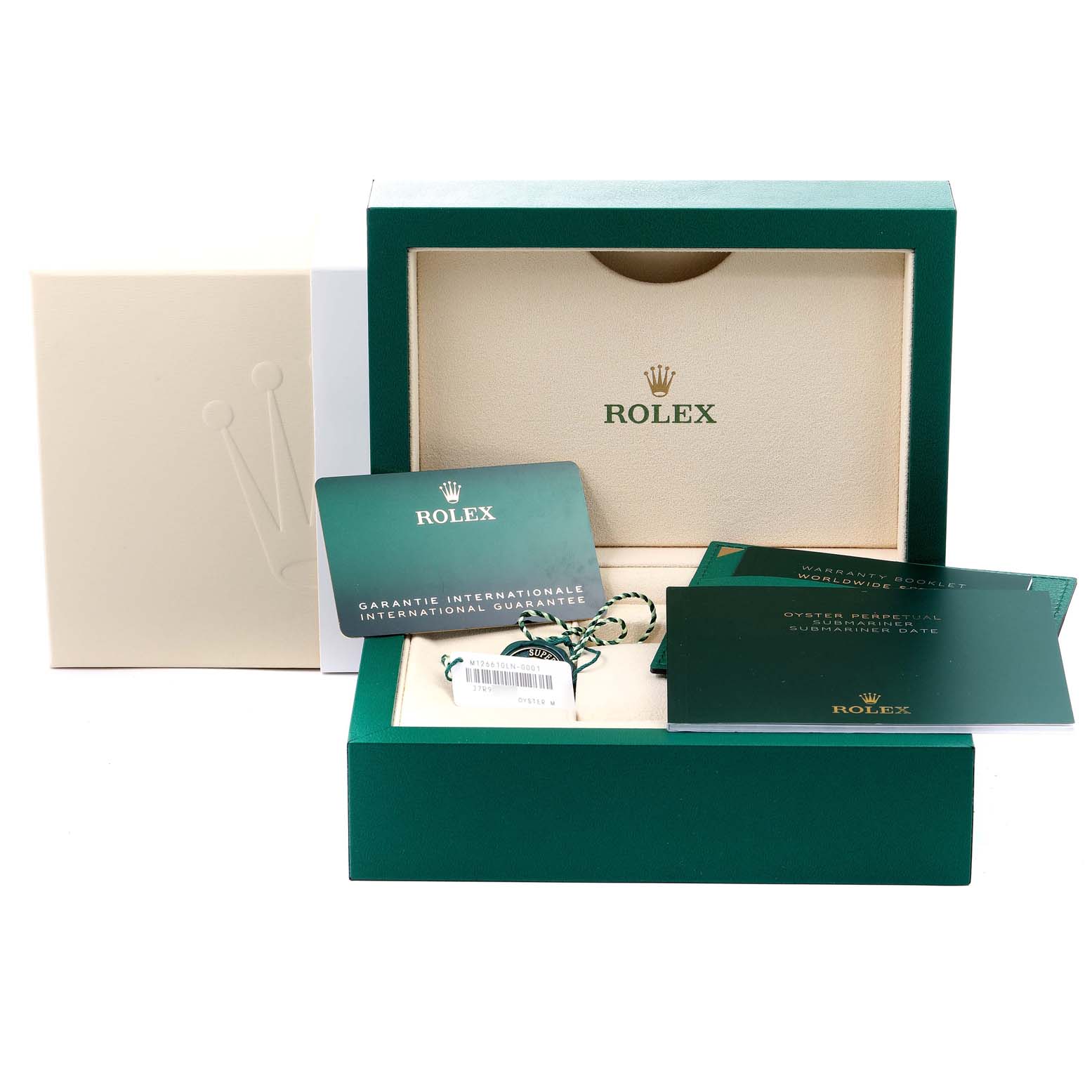 The image shows packaging and accessories for a Rolex Submariner 126610LN Men
s Stainless Steel Black Dial 126610LN Men
s Stainless Steel Black Dial, including the watch box and warranty booklets.