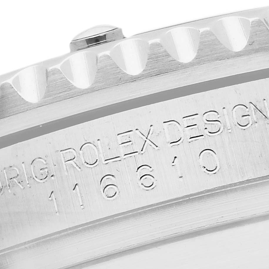 The image shows a close-up of the rim and engraving on the Rolex Submariner 116610LN Men's Stainless Steel Black Dial 116610LN Men's Stainless Steel Black Dial, highlighting the model number and design text.