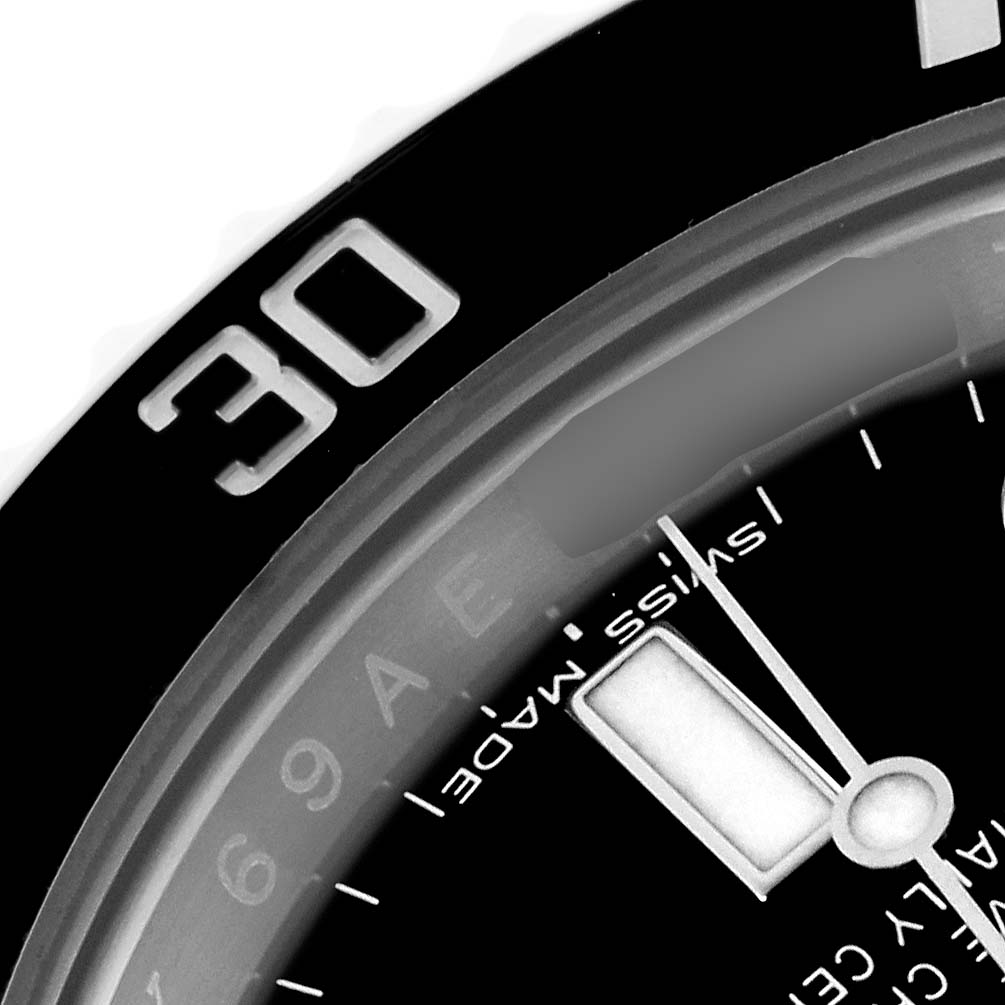 The close-up angle of the Rolex Submariner 116610LN Men's Stainless Steel Black Dial 116610LN Men's Stainless Steel Black Dial shows part of the dial, bezel, and "Swiss Made" text.