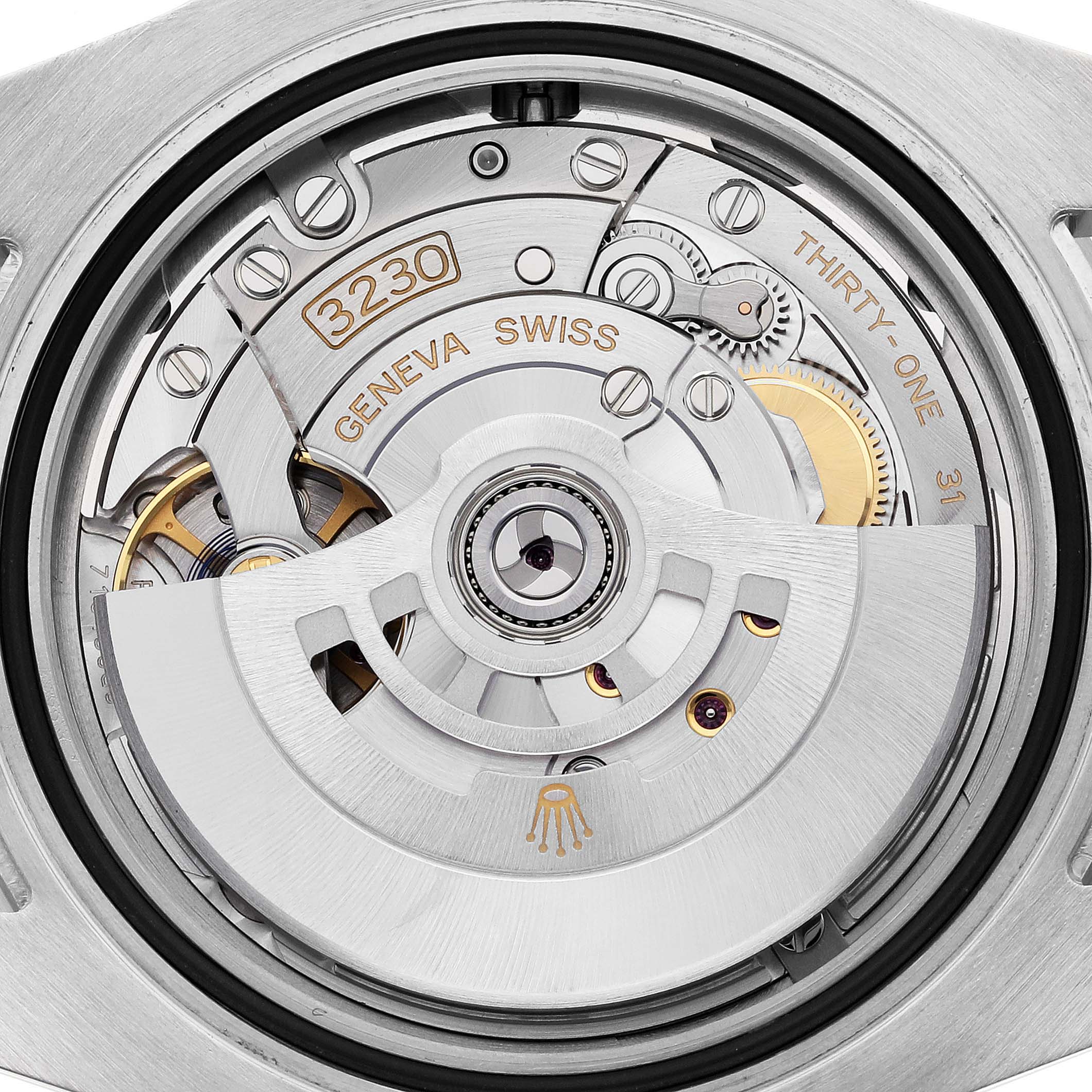 The image shows the movement of a Rolex Submariner 124060 Men's Stainless Steel Black Dial 124060 Men's Stainless Steel Black Dial from the back, highlighting its mechanical components.