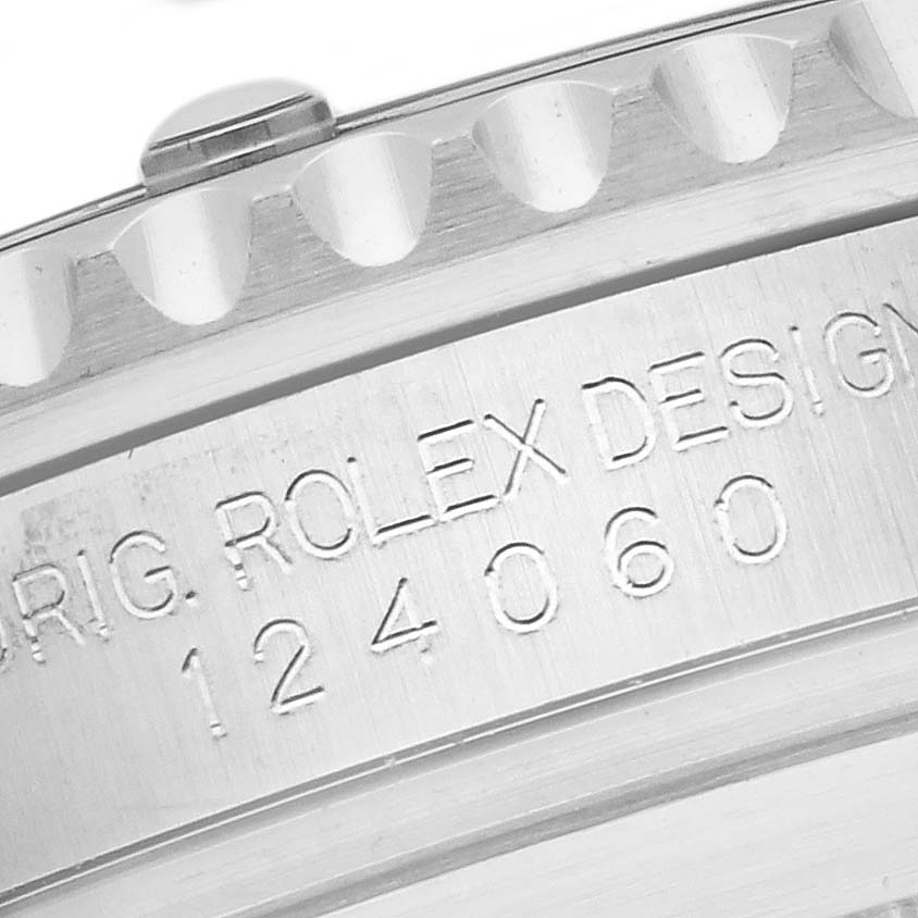 The image shows a close-up of the side engraving on a Rolex Submariner 124060 Men's Stainless Steel Black Dial 124060 Men's Stainless Steel Black Dial with the model number visible.