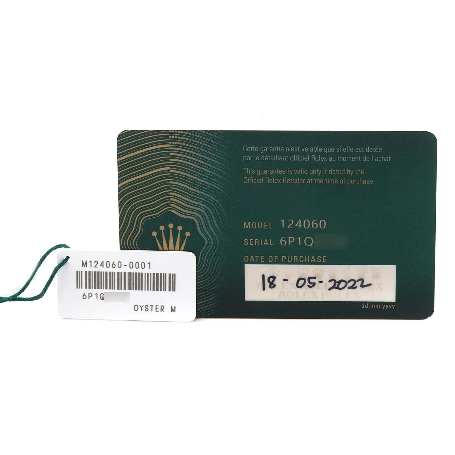 The image shows the warranty card and tag for a Rolex Submariner 124060 Men's Stainless Steel Black Dial 124060 Men's Stainless Steel Black Dial, model 124060.