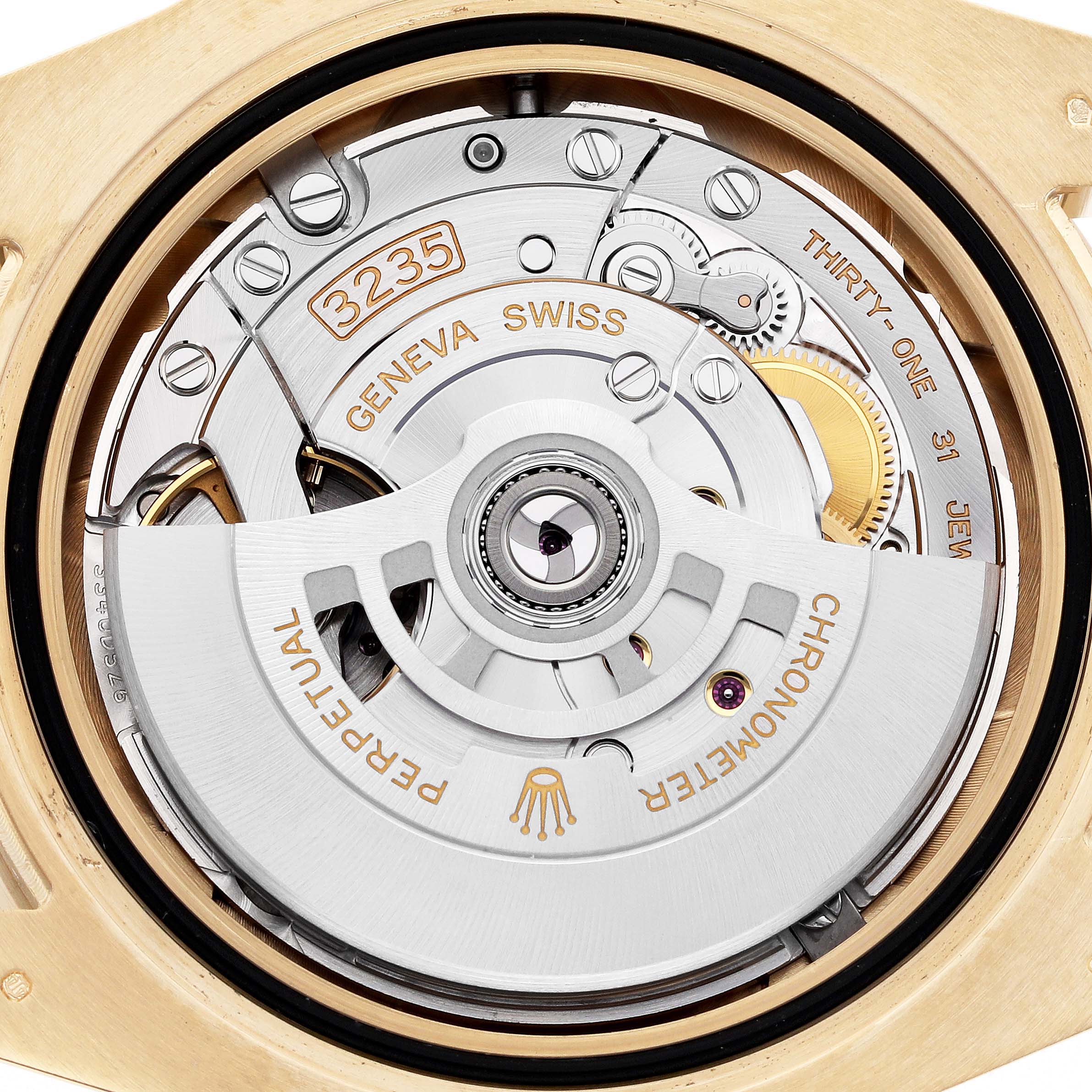 The image shows a close-up of the movement of a Rolex Submariner 126618LN Men
s Yellow Gold Black Dial 126618LN Men
s Yellow Gold Black Dial, highlighting the rotor and intricate mechanical parts.