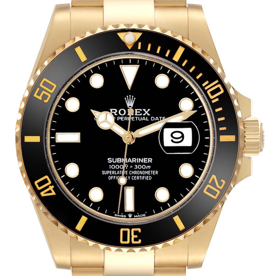 The image shows a Rolex Submariner watch from the front, highlighting the black dial, gold bezel, and date window.