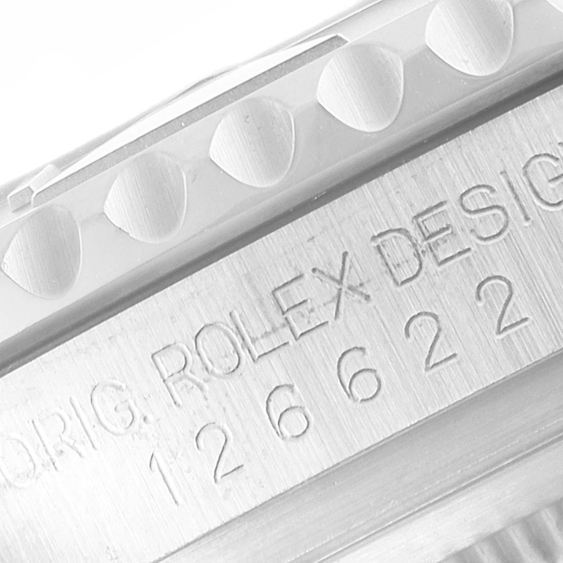 This close-up image shows the engraved side of the case and bezel of a Rolex Yacht-Master 126622 Men's Stainless Steel Blue Dial 126622 Men's Stainless Steel Blue Dial watch.