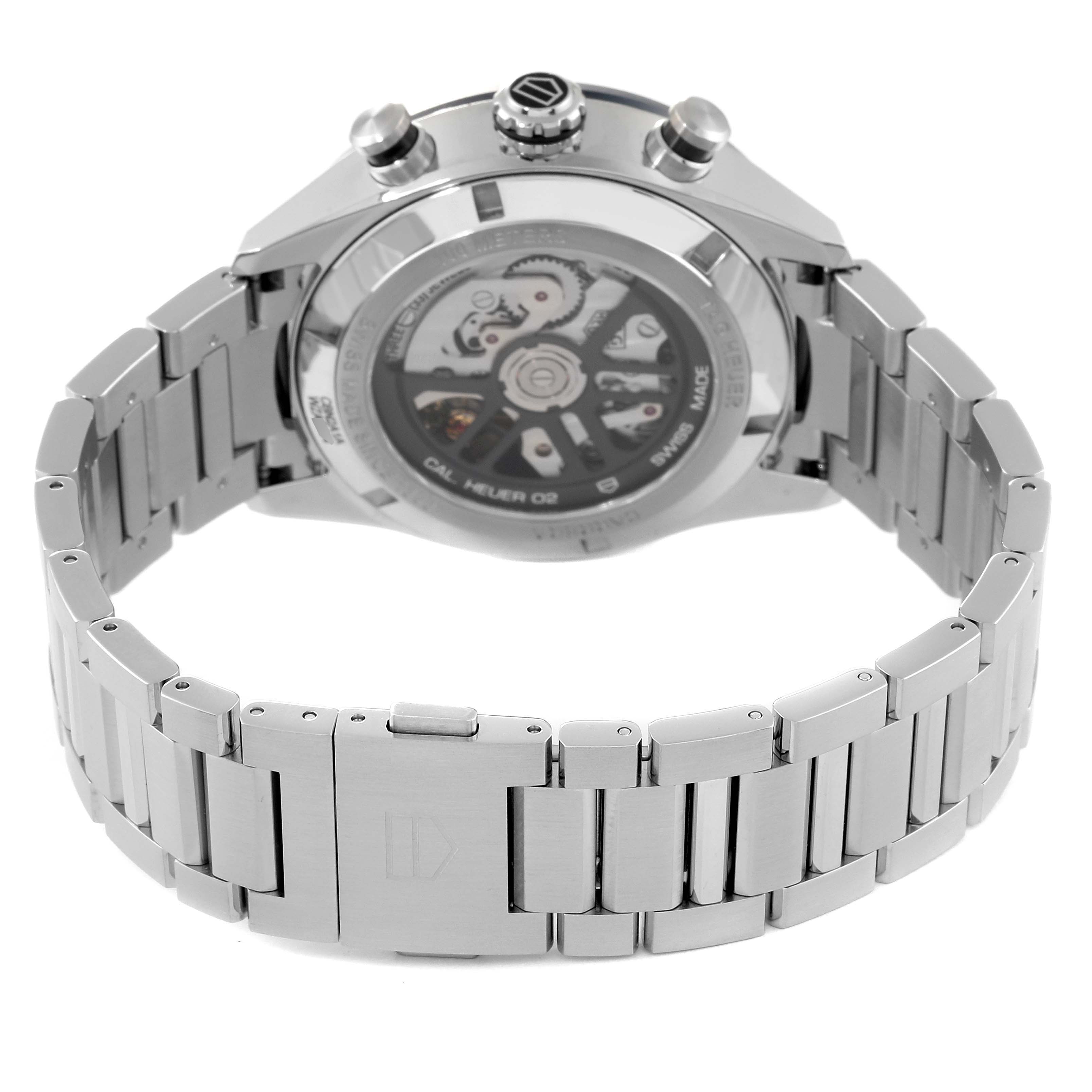 The image shows a rear view of the Tag Heuer Carrera CBN2A1A.BA0643 Men's Stainless Steel Blue Dial CBN2A1A.BA0643 Men's Stainless Steel Blue Dial watch showcasing its metal bracelet and exposed movement.