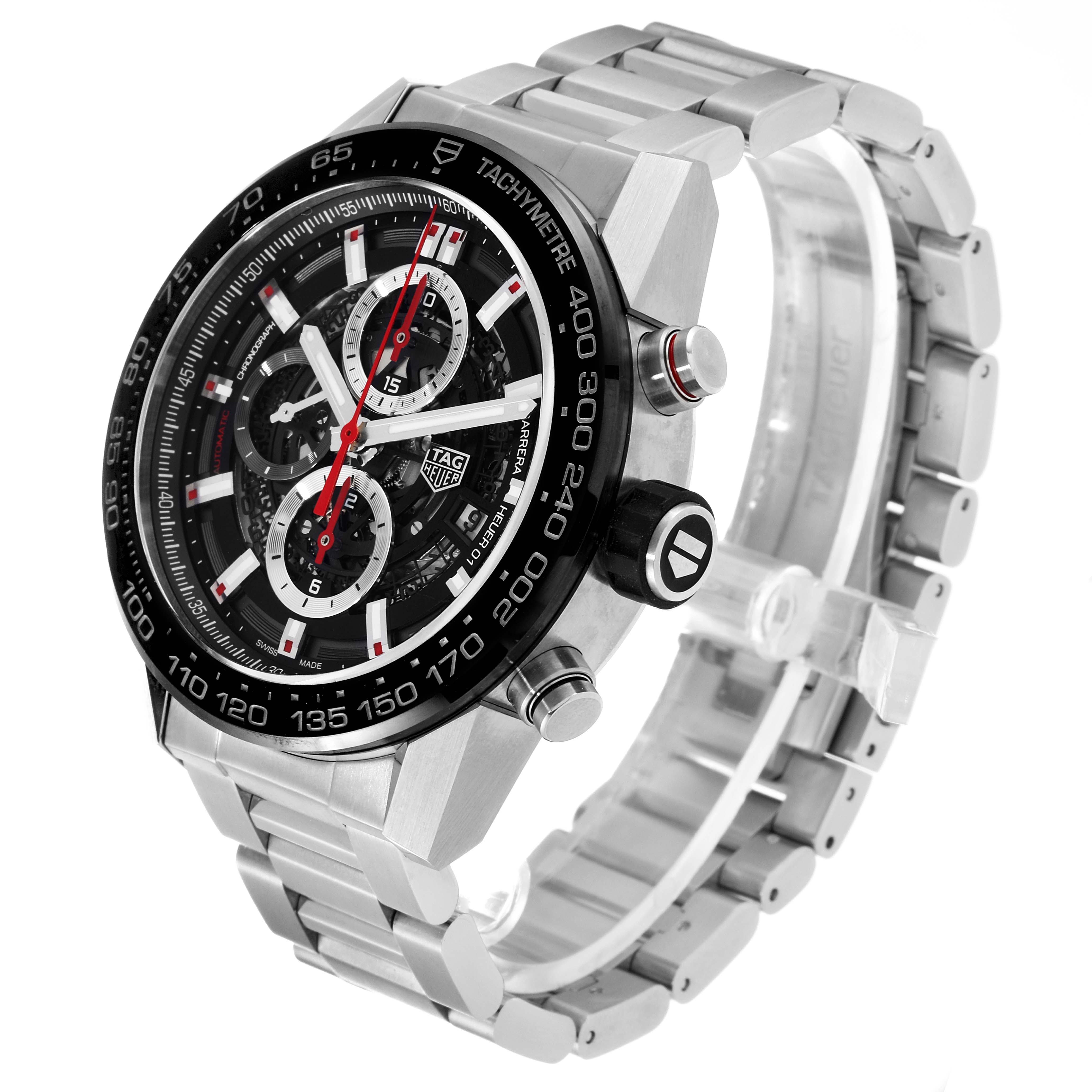 The image shows a side angle of the Tag Heuer Carrera CAR2A1W.BA0703 Men's Stainless Steel Transparent Dial CAR2A1W.BA0703 Men's Stainless Steel Transparent Dial watch, highlighting its face, tachymeter bezel, and stainless steel bracelet.