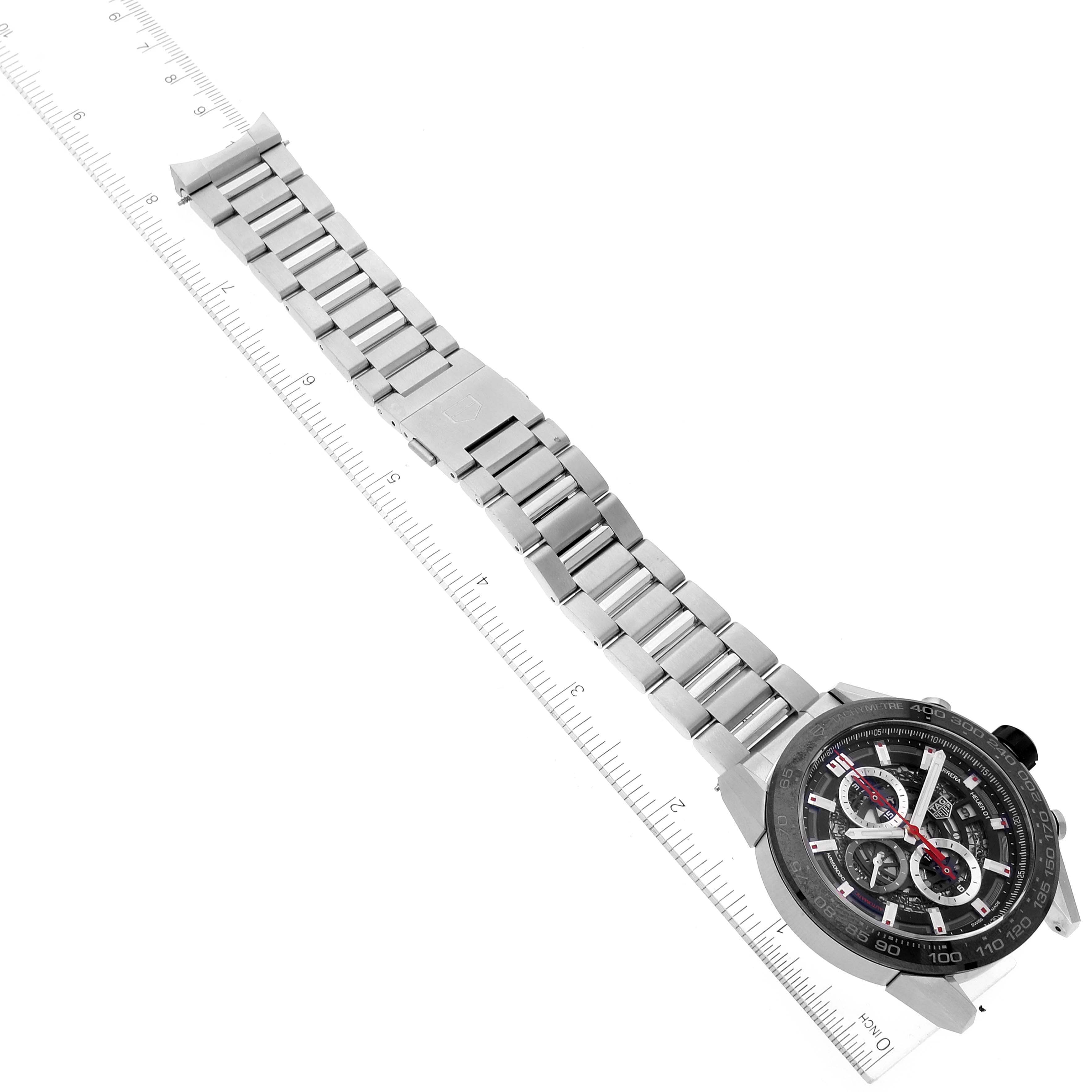 This image shows the Tag Heuer Carrera CAR2A1W.BA0703 Men's Stainless Steel Transparent Dial CAR2A1W.BA0703 Men's Stainless Steel Transparent Dial watch at a slight angle, displaying the face, bezel, and full metal bracelet.