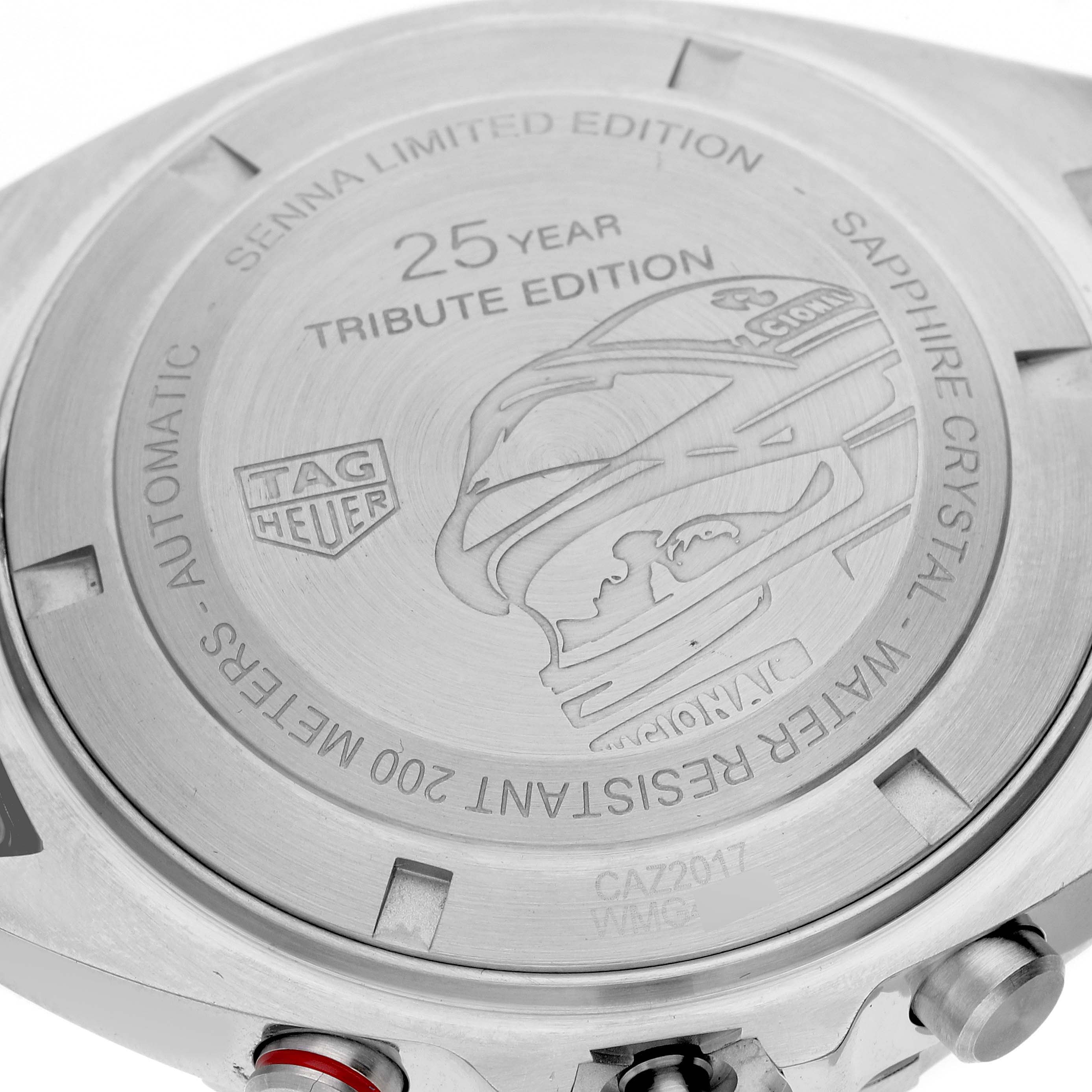 This image shows the engraved case back of the Tag Heuer Formula 1 CAZ2017.BA0647 Men's Stainless Steel Grey Dial CAZ2017.BA0647 Men's Stainless Steel Grey Dial Senna Limited Edition watch from a top-down angle.