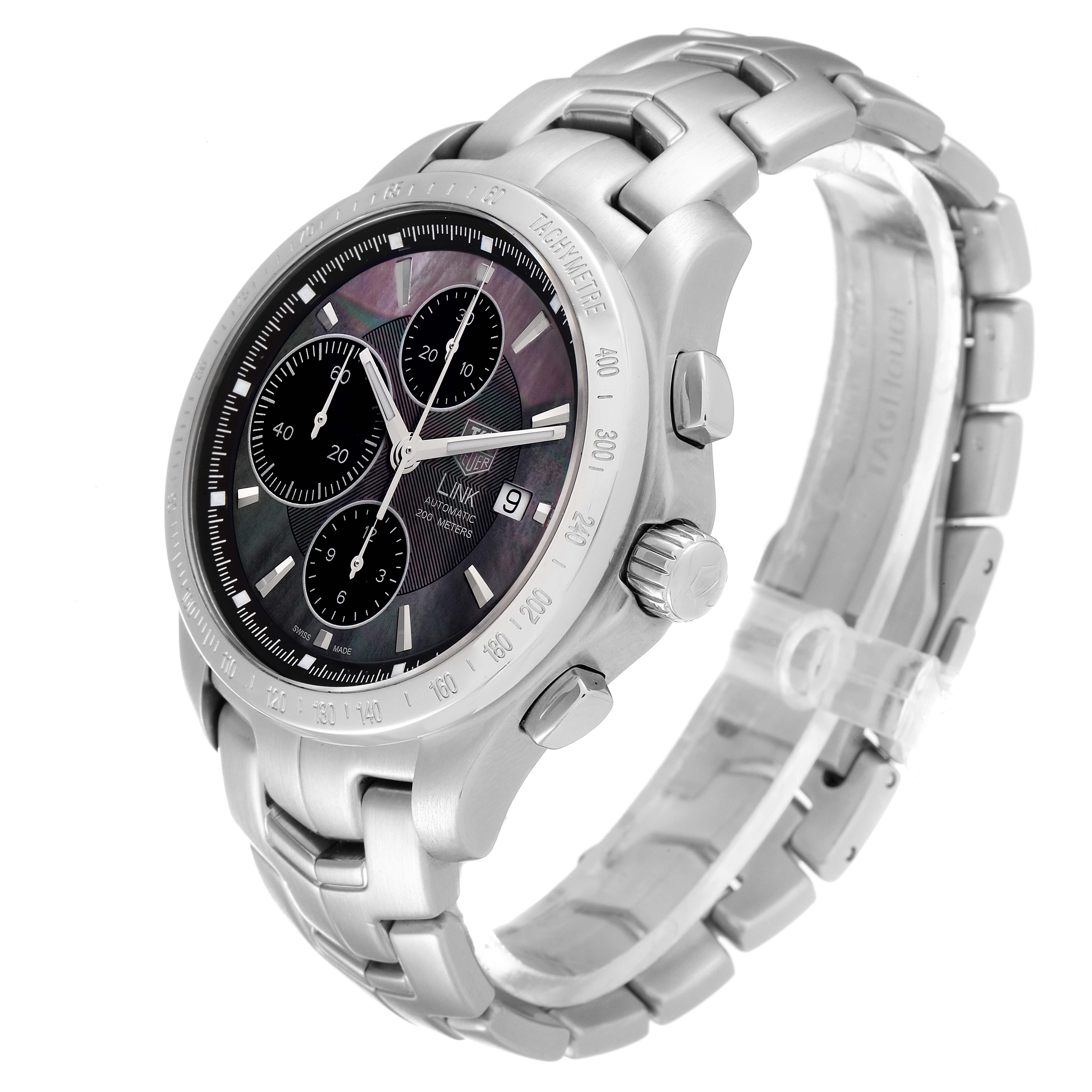 The image shows a Tag Heuer Link model watch with a round face, bracelet, crown, pushers, and clasp in a three-quarter angle.