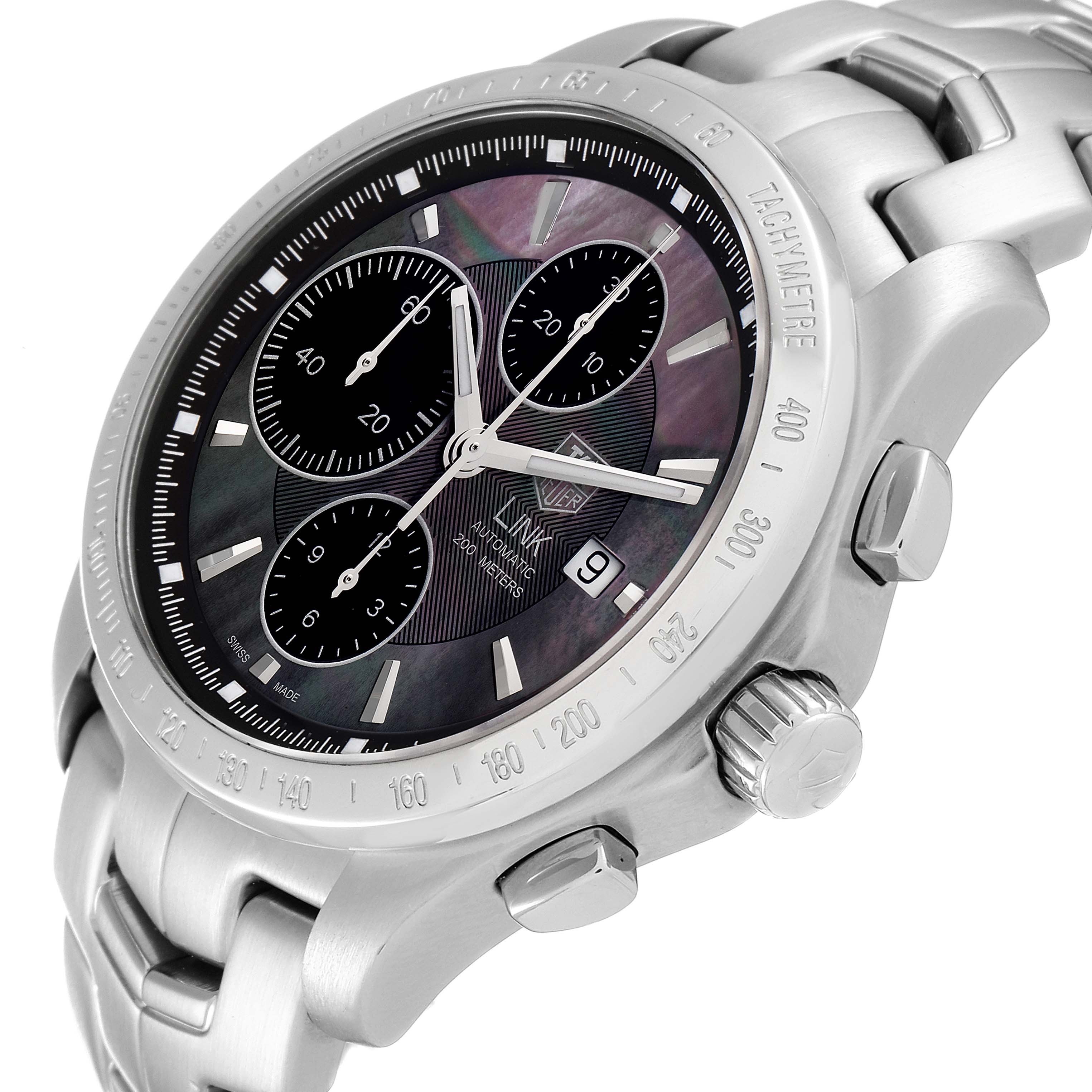 The image shows a Tag Heuer Link model watch from a slightly tilted angle, displaying its bezel, dial, pushers, crown, and bracelet.