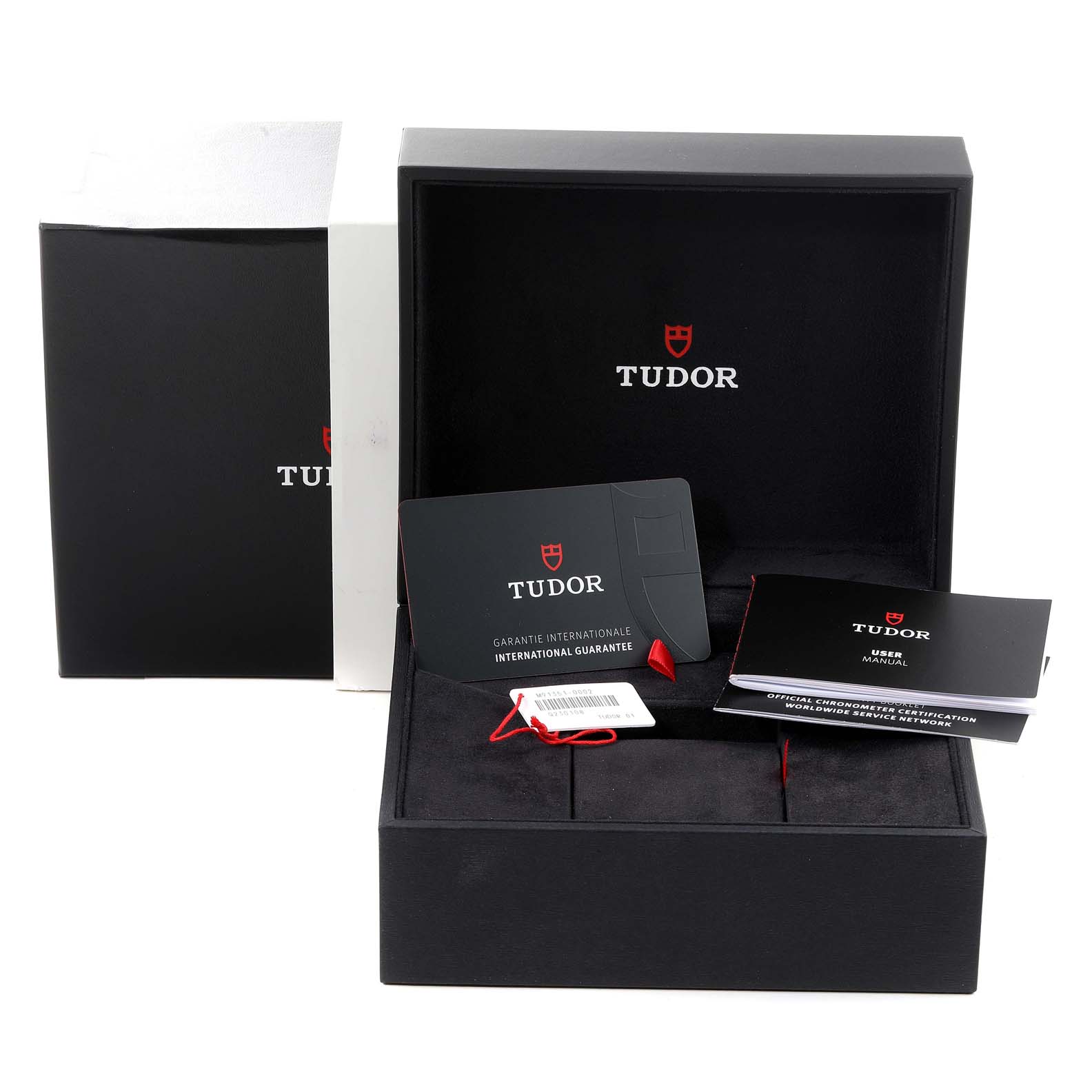 This image shows the packaging, guarantee card, and user manual for the Tudor M91351-002 Women's Steel and Gold (two tone) Silver Dial M91351-002 Women's Steel and Gold (two tone) Silver Dial 1926 M91351 model.