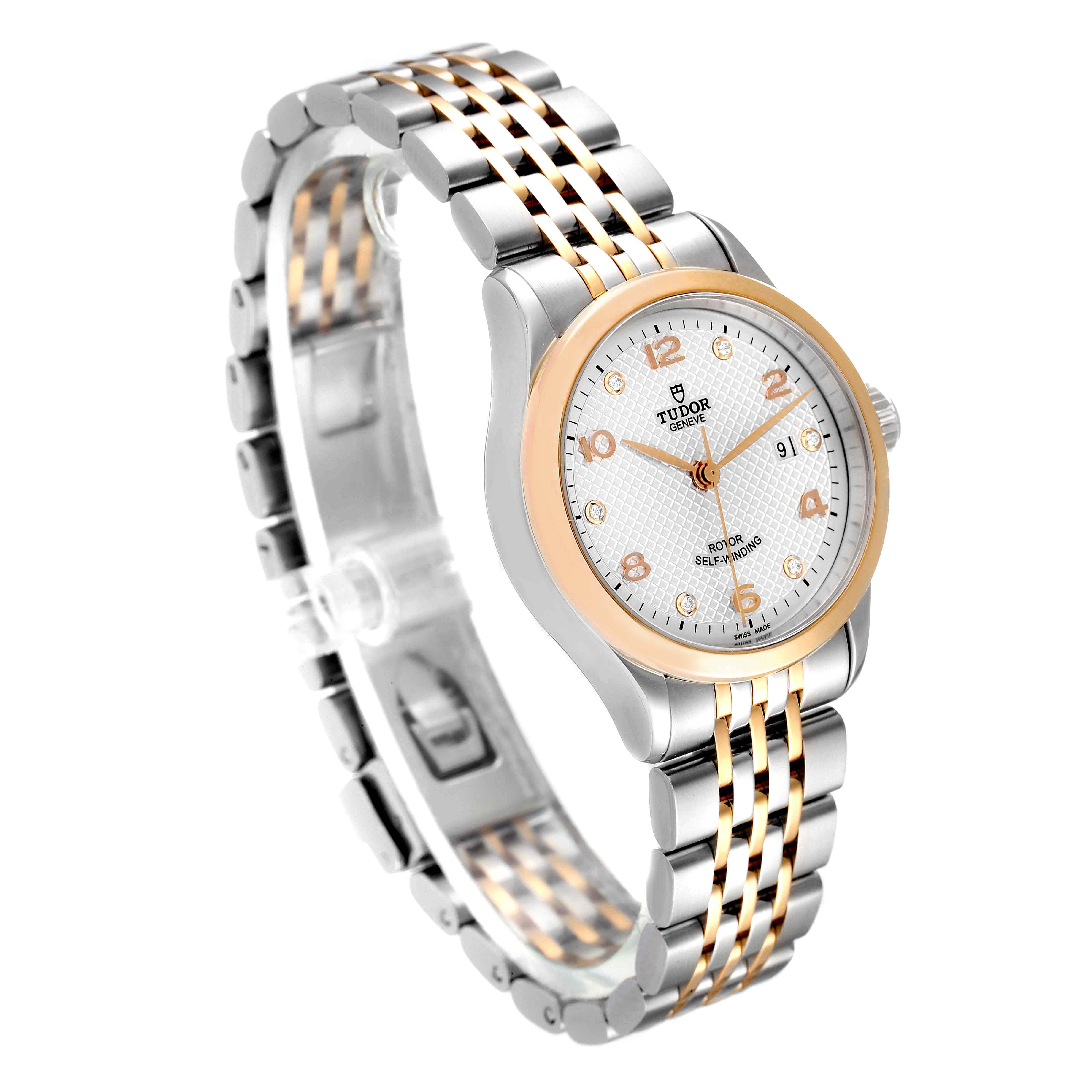 The image shows a Tudor M91351-002 Women's Steel and Gold (two tone) Silver Dial M91351-002 Women's Steel and Gold (two tone) Silver Dial 1926 28mm Steel Rose Gold Silver Dial Diamond Watch M91351 at an angled side view, highlighting the face and bracelet.