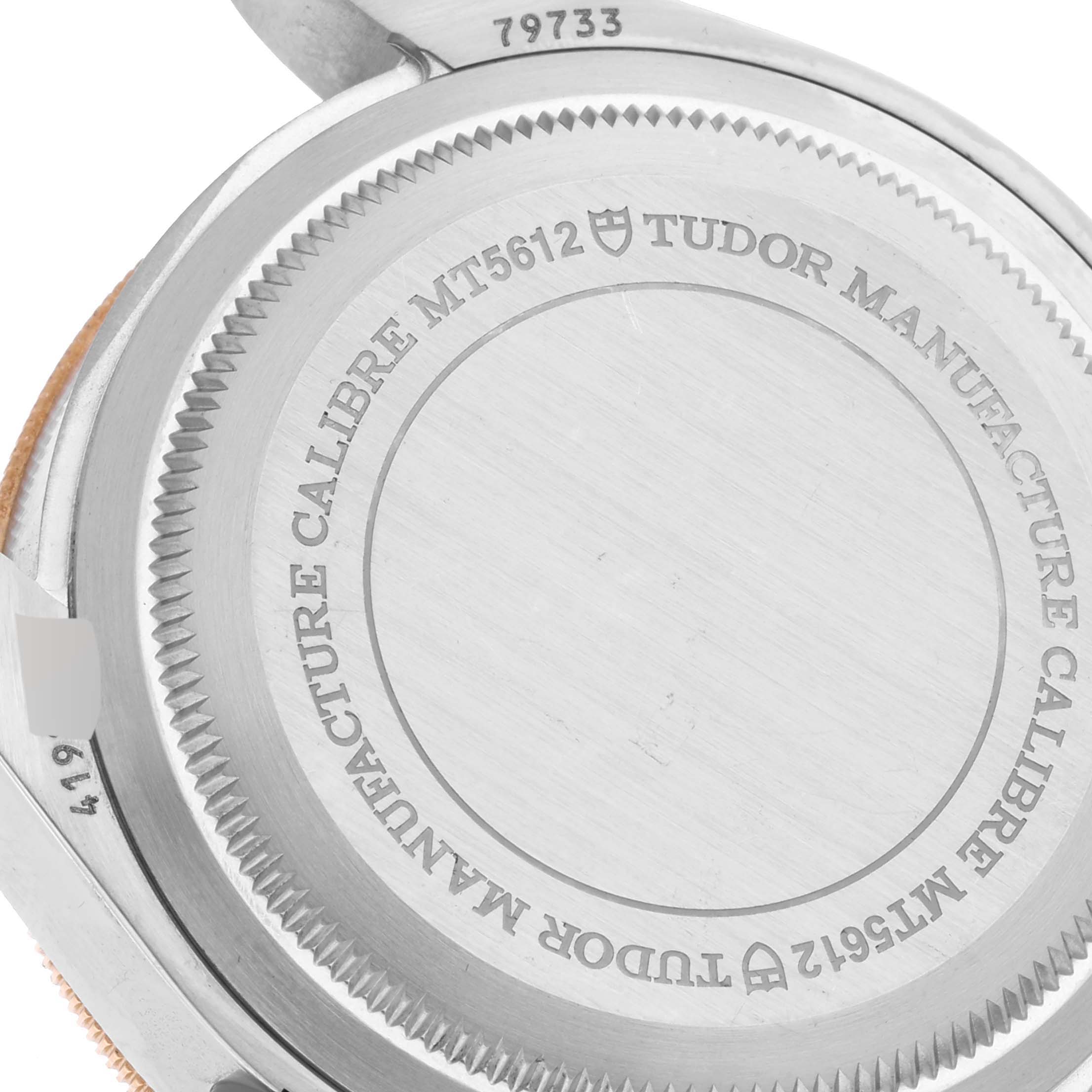 The image shows the back case of the Tudor Heritage Black Bay 79733N Men
s Steel and Gold (two tone) Black Dial 79733N Men
s Steel and Gold (two tone) Black Dial watch, highlighting the model number and Manufacture Calibre MT5612.