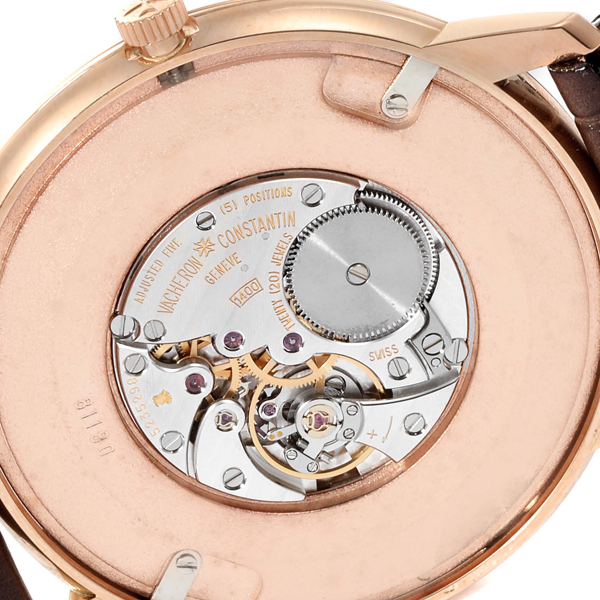 The image shows the back of the Vacheron Constantin Patrimony 81180/000R-9159 Men's Rose Gold Silver Dial 81180/000R-9159 Men's Rose Gold Silver Dial watch, revealing its intricate mechanical movement.
