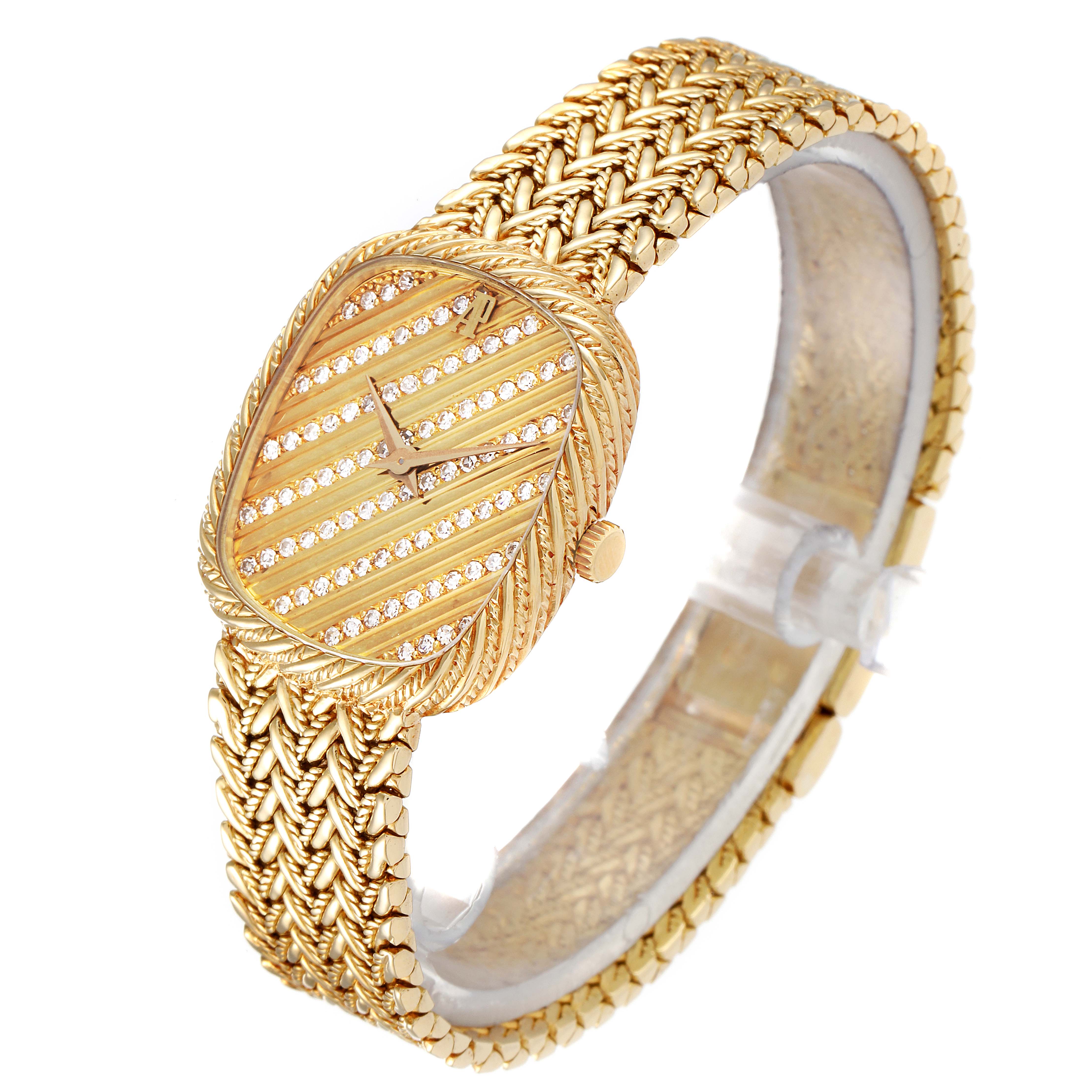 The image shows a Vintage Audemars Piguet watch at an angled view, highlighting its textured gold bracelet and diamond-accented dial.