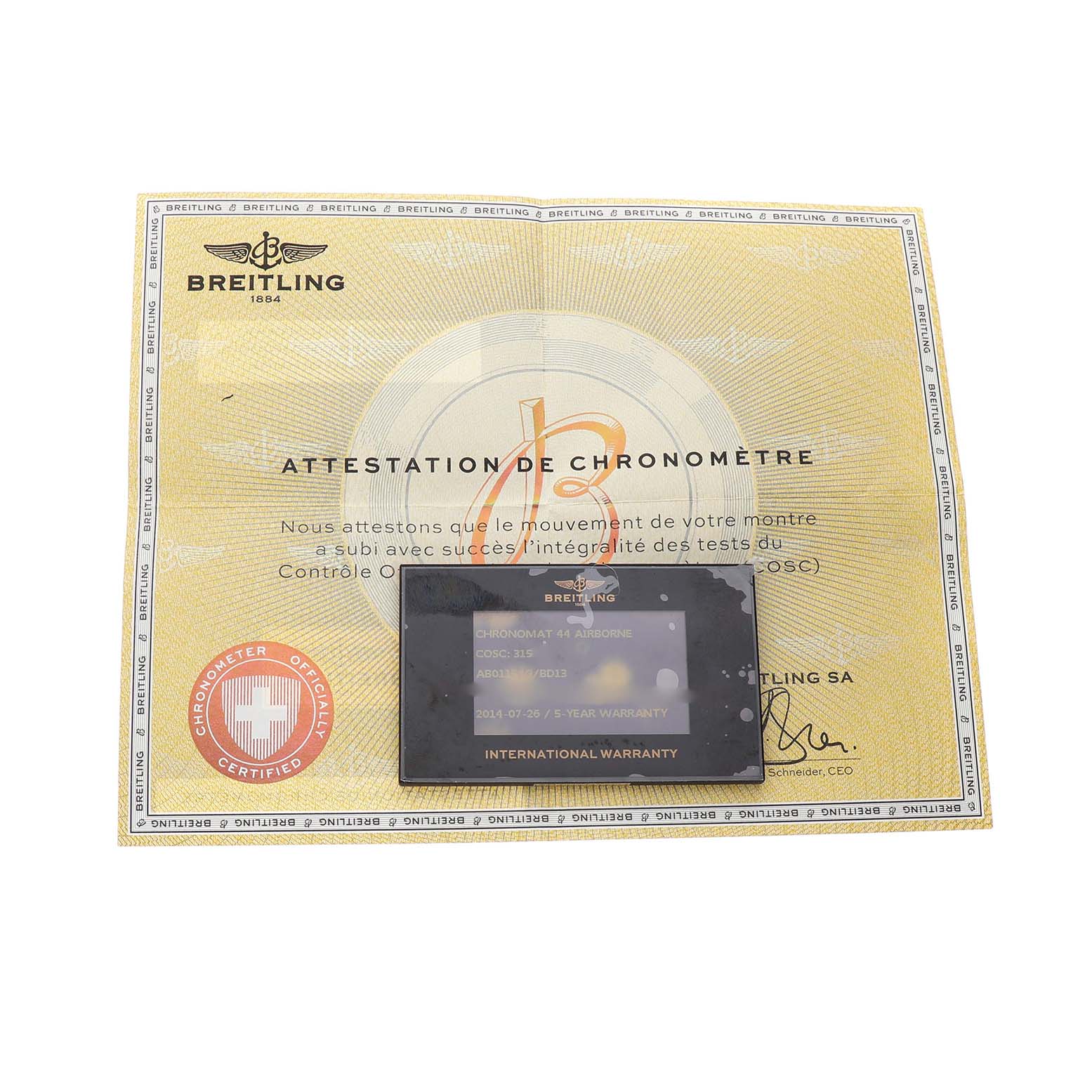 The image shows a Breitling Chronomat AB01154G/BD13 Men's Stainless Steel Black Dial model warranty card and chronometer certificate from a top view.