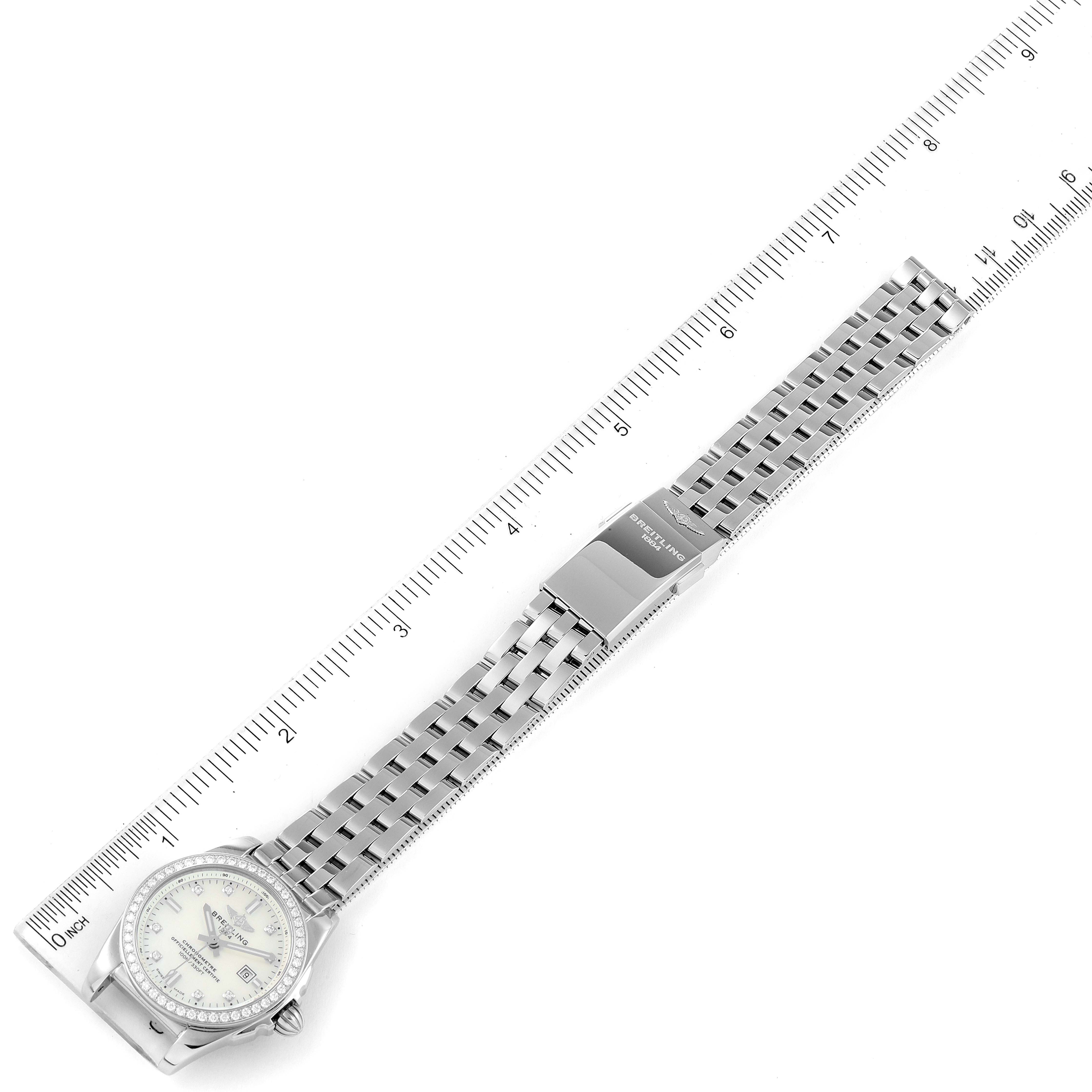 The image shows a Breitling A7234853/A785/791A Women's Stainless Steel Mother of Pearl Dial A7234853/A785/791A Women's Stainless Steel Mother of Pearl Dial Galactic 29 MOP Diamond Steel Ladies Watch A72348 Card model laid flat, displaying the full bracelet and face alongside a ruler.