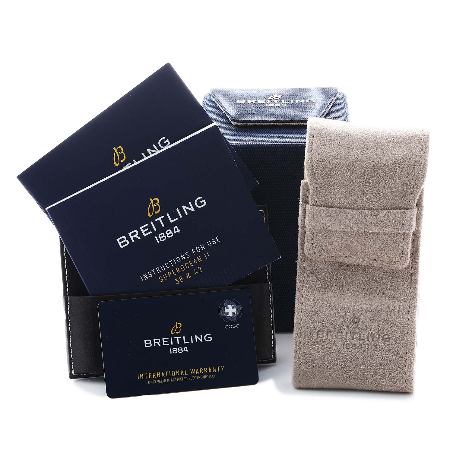 The image shows the packaging, manuals, and warranty card for the Breitling Superocean A17366 Men's Stainless Steel Blue Dial, viewed from the front.