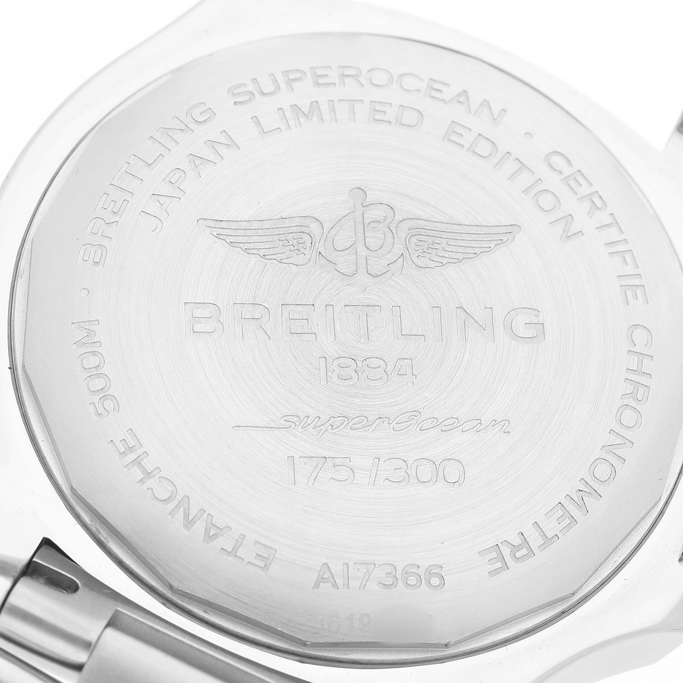 The image shows the case back of a Breitling Superocean A17366 Men's Stainless Steel Blue Dial, featuring engravings and limited edition details.