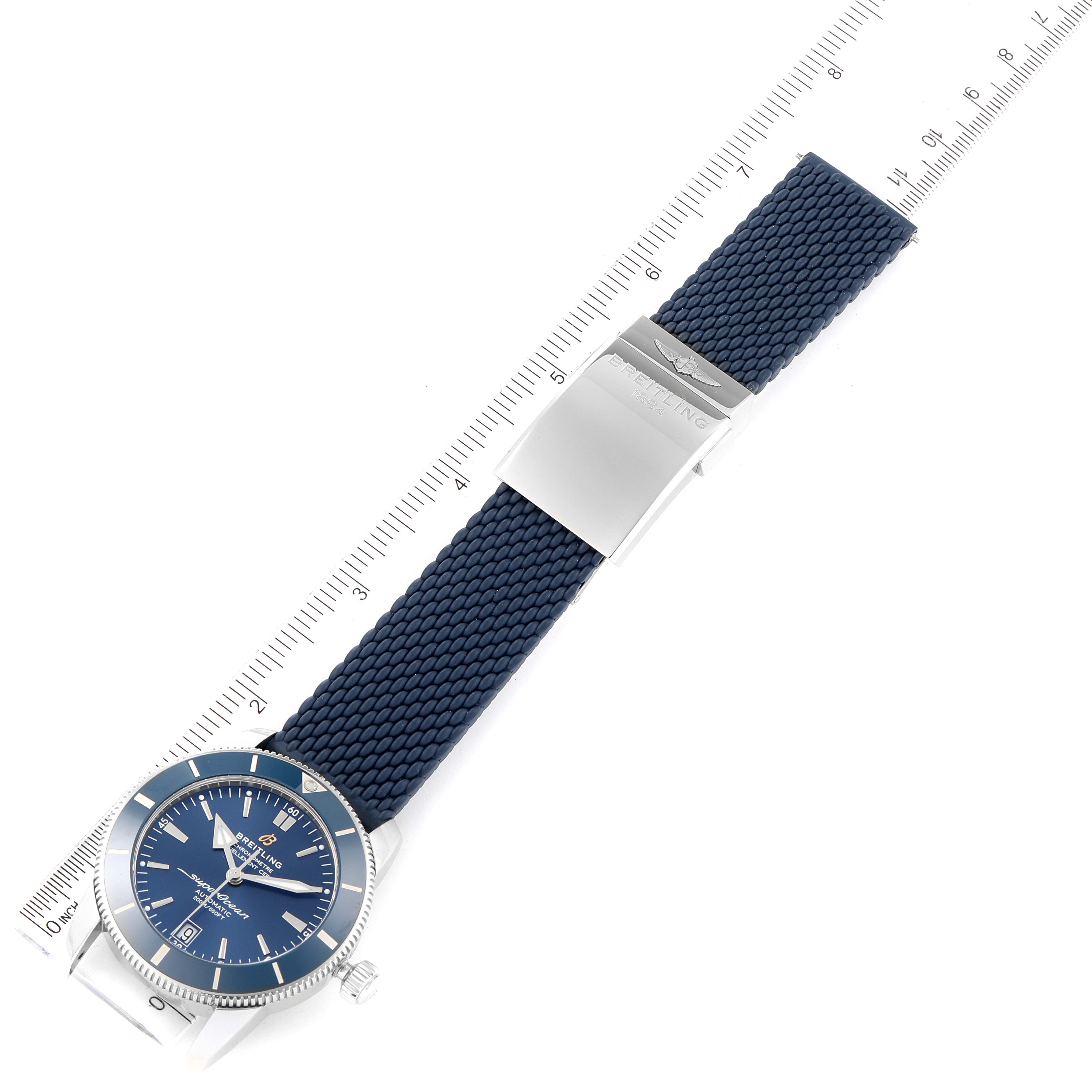 The image shows a top-down view of a Breitling Superocean A17321 Men's Stainless Steel Blue Dial A17321 Men's Stainless Steel Blue Dial watch, displaying its blue dial and matching strap with a clasp.