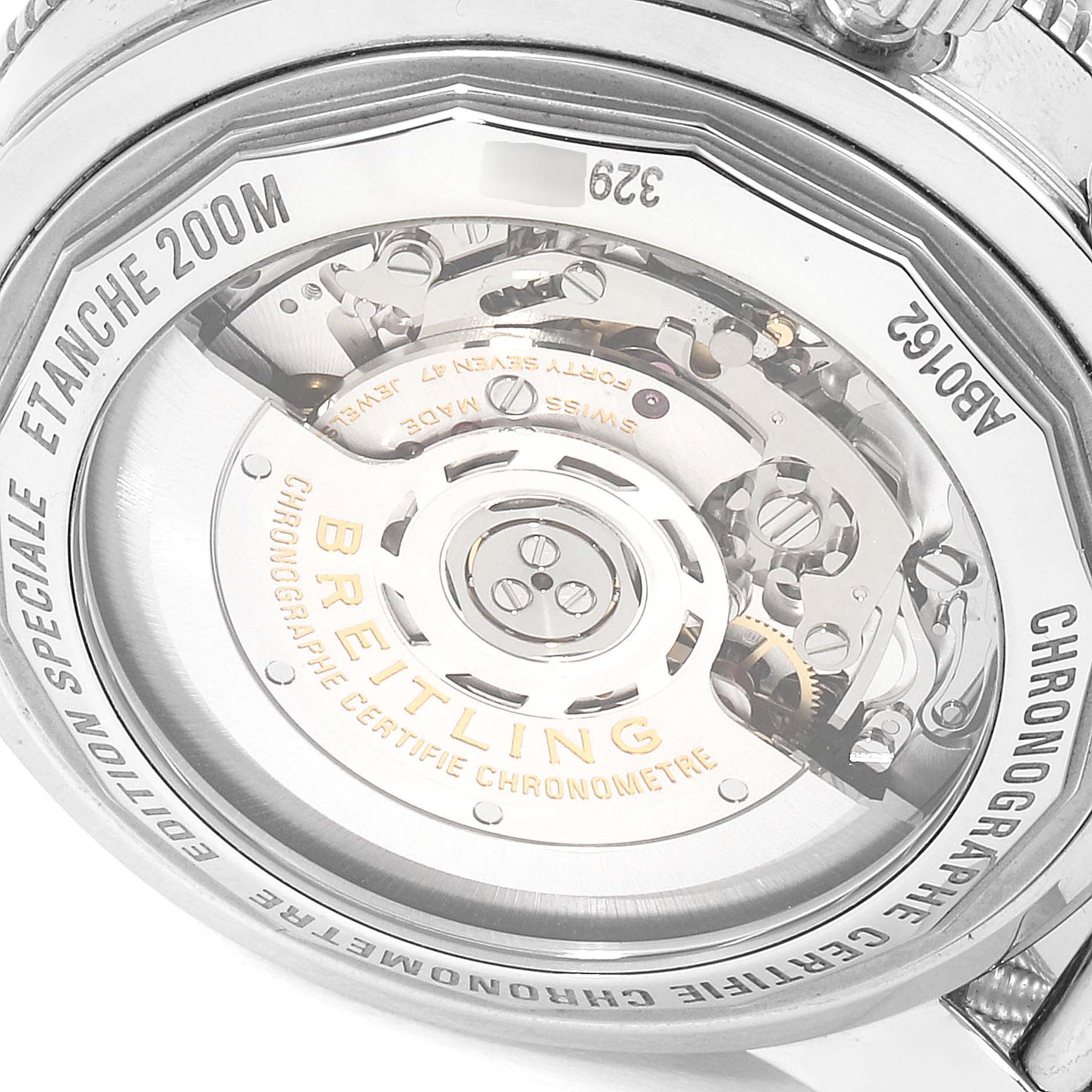 The image shows the case back of a Breitling Superocean AB016212/G840/154A Men
s Stainless Steel Silver Dial AB016212/G840/154A Men
s Stainless Steel Silver Dial watch, highlighting its internal mechanics and engravings.