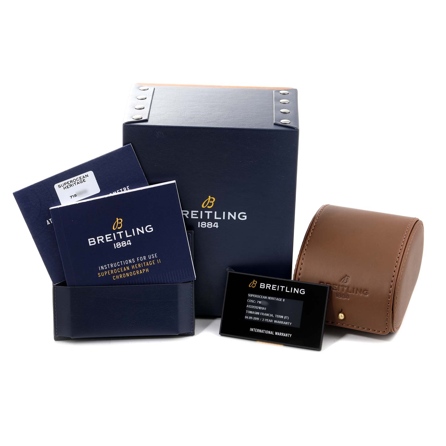 The image shows the packaging, manuals, warranty card, and carrying case for the Breitling Superocean A13320 Men's Stainless Steel Black Dial A13320 Men's Stainless Steel Black Dial model.