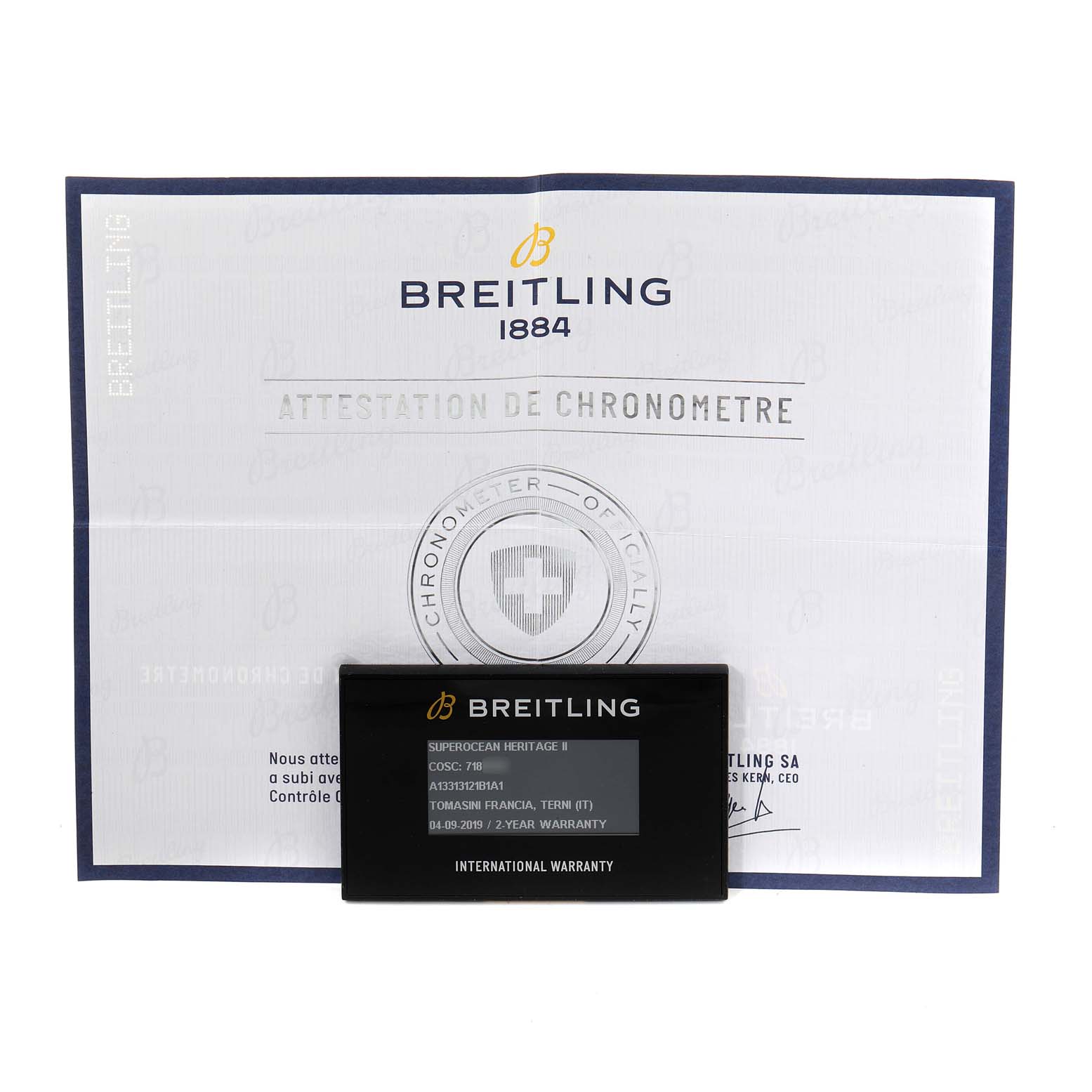 The image shows the warranty card and chronometer certificate for a Breitling Superocean A13320 Men's Stainless Steel Black Dial A13320 Men's Stainless Steel Black Dial model, displayed from the front.