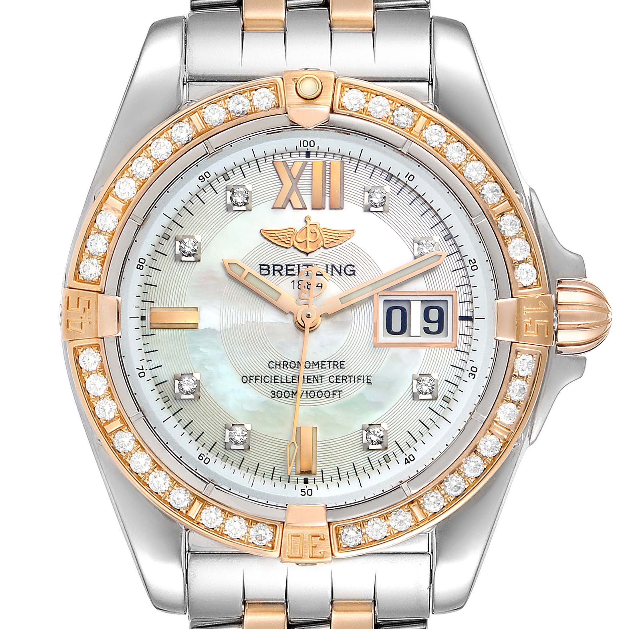 The image shows a close-up of a Breitling Windrider C49350 Men's Steel and Gold (two tone) Mother of Pearl Dial C49350 Men's Steel and Gold (two tone) Mother of Pearl Dial watch face and bezel, highlighting its two-tone design and diamond accents.