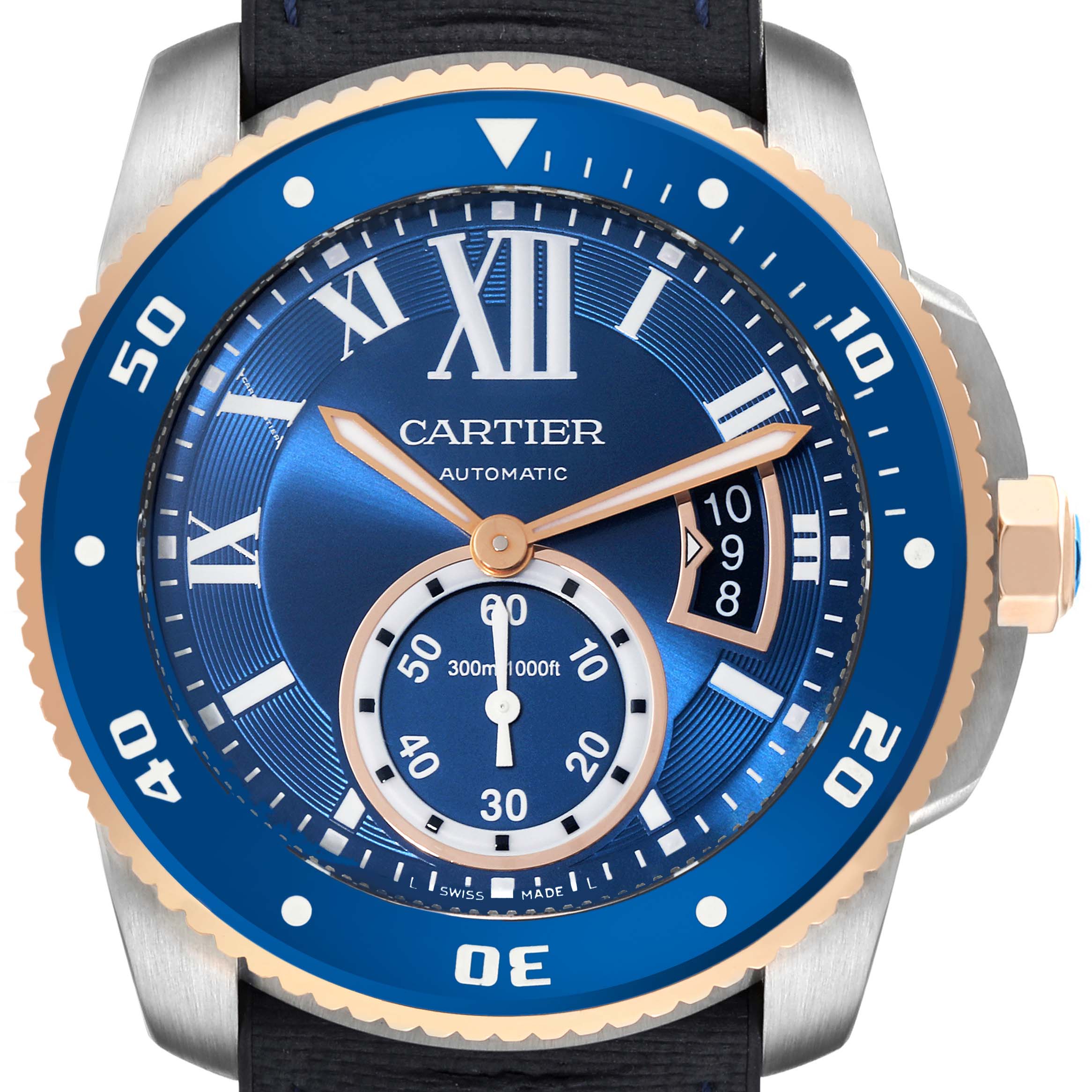 This image shows the face of a Calibre de Cartier watch by Cartier, featuring a blue bezel and dial with gold accents.