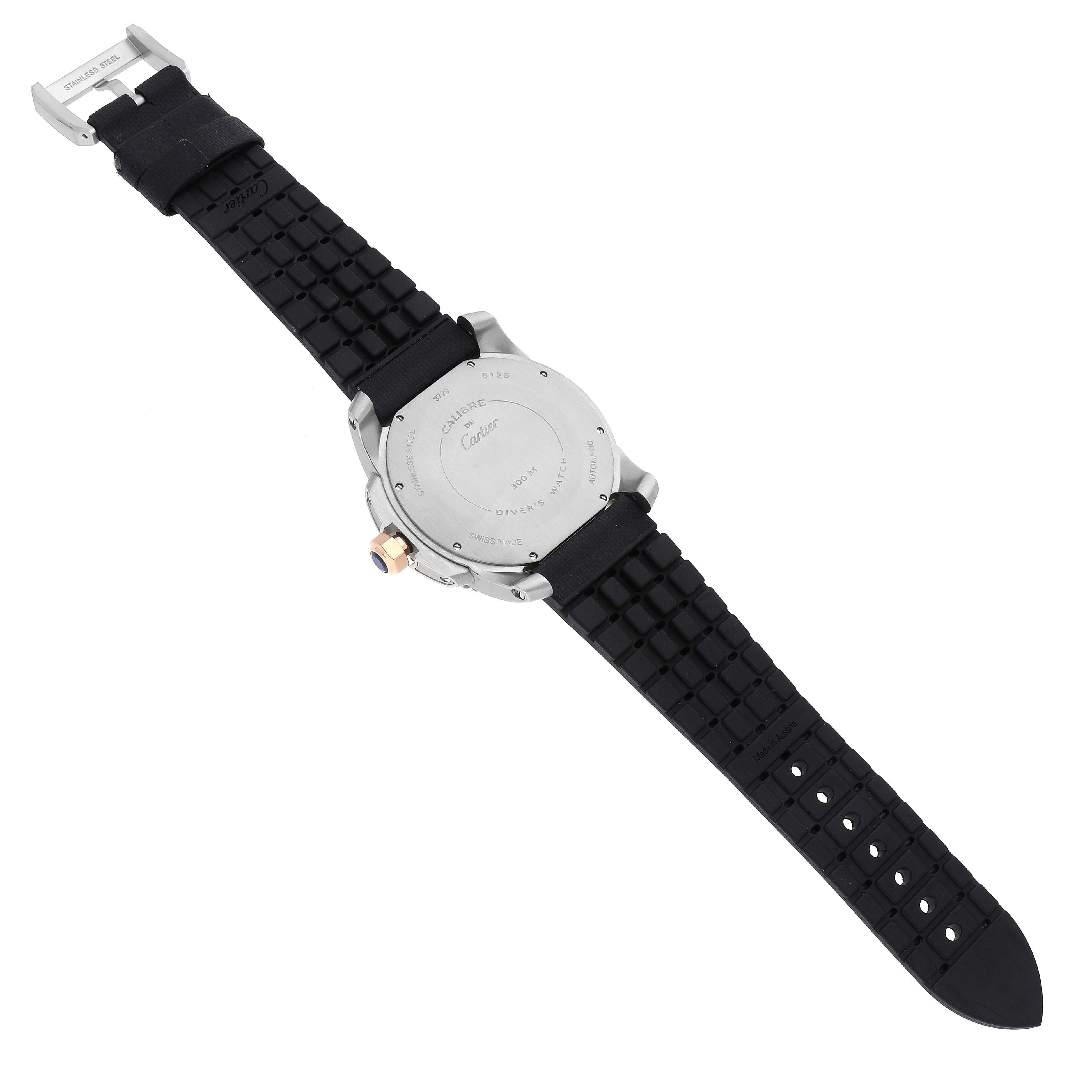 The image shows the back case and strap of the Calibre de Cartier watch by Cartier from a rear angle.