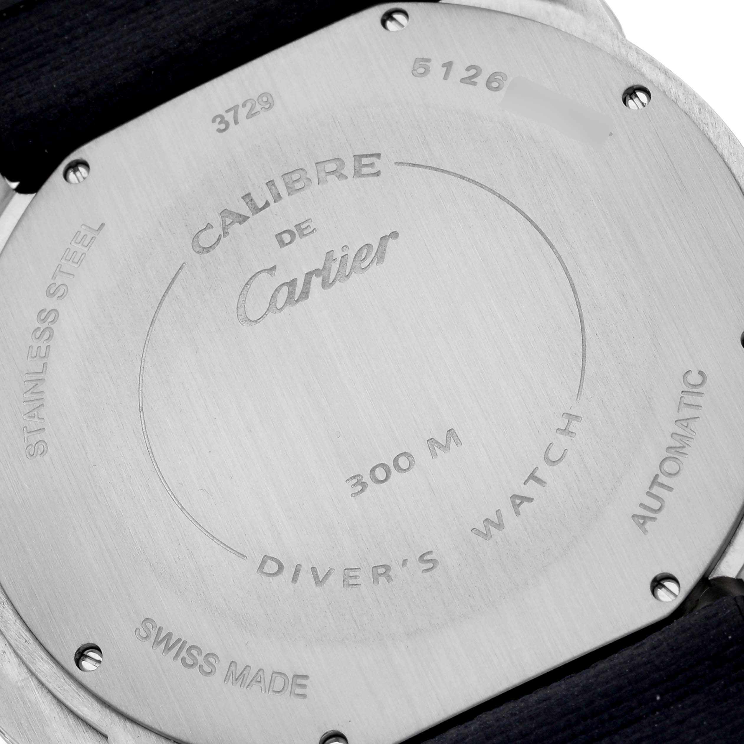 The image shows the case back of the Calibre de Cartier Diver's Watch by Cartier, highlighting text and markings.