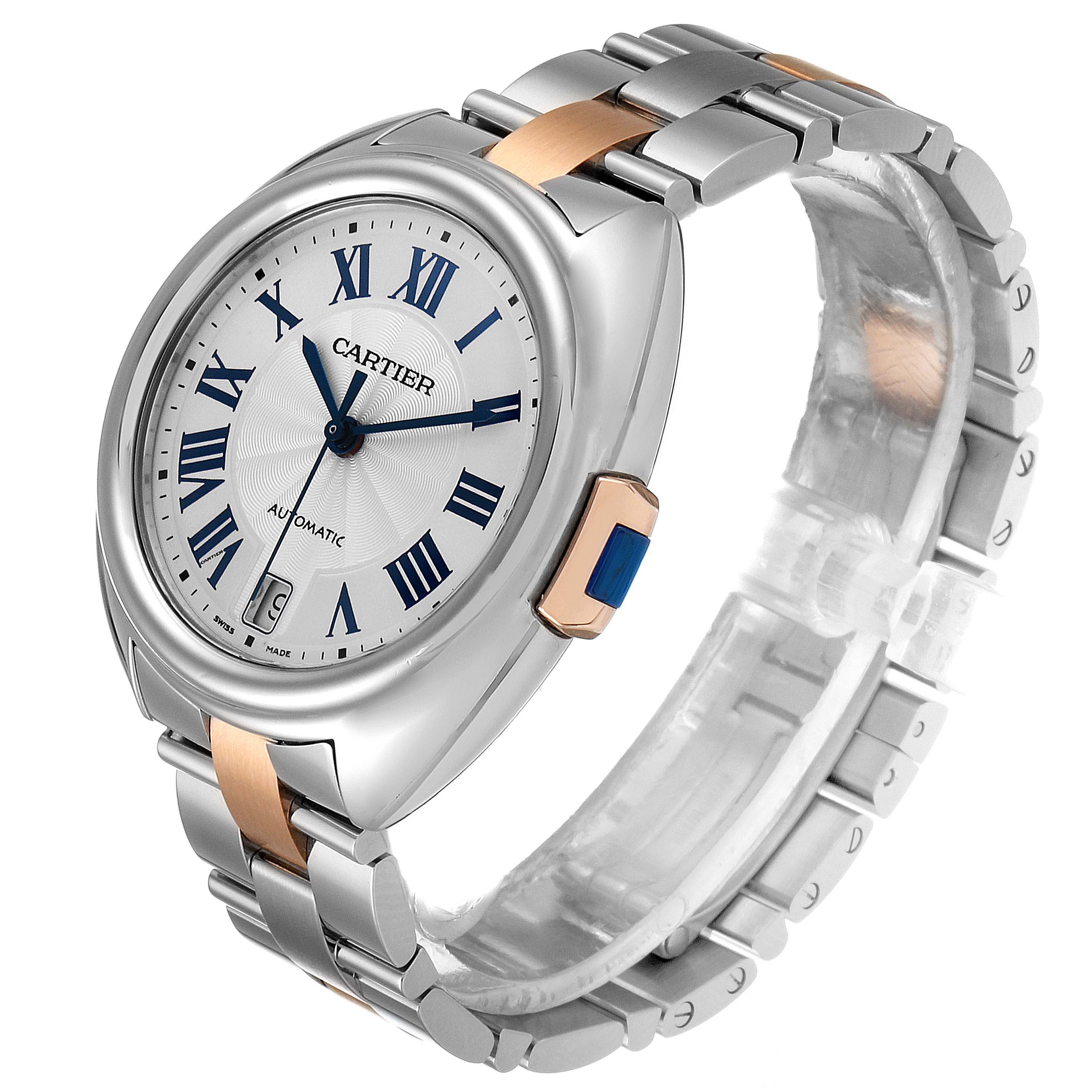 The Cartier Clé model watch is shown at a three-quarter angle, displaying its face, case, and bracelet.