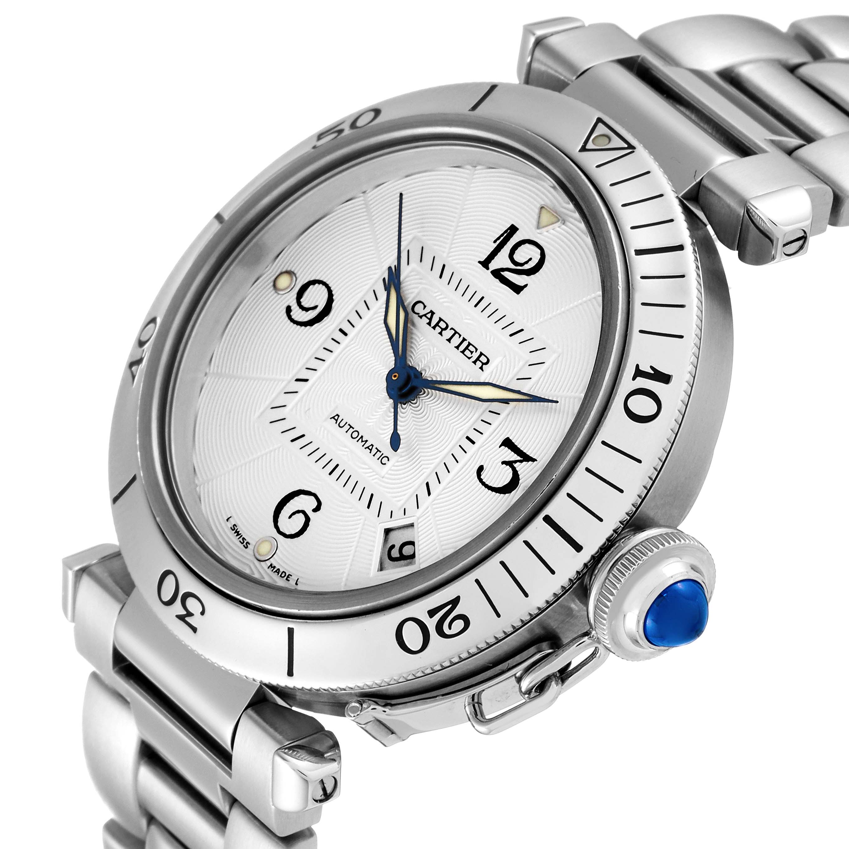 This is a close-up angle of a Cartier Pasha W31059H3 Men
s Stainless Steel Silver Dial W31059H3 Men
s Stainless Steel Silver Dial watch, highlighting the dial, bezel, bracelet, and crown with a blue cabochon.