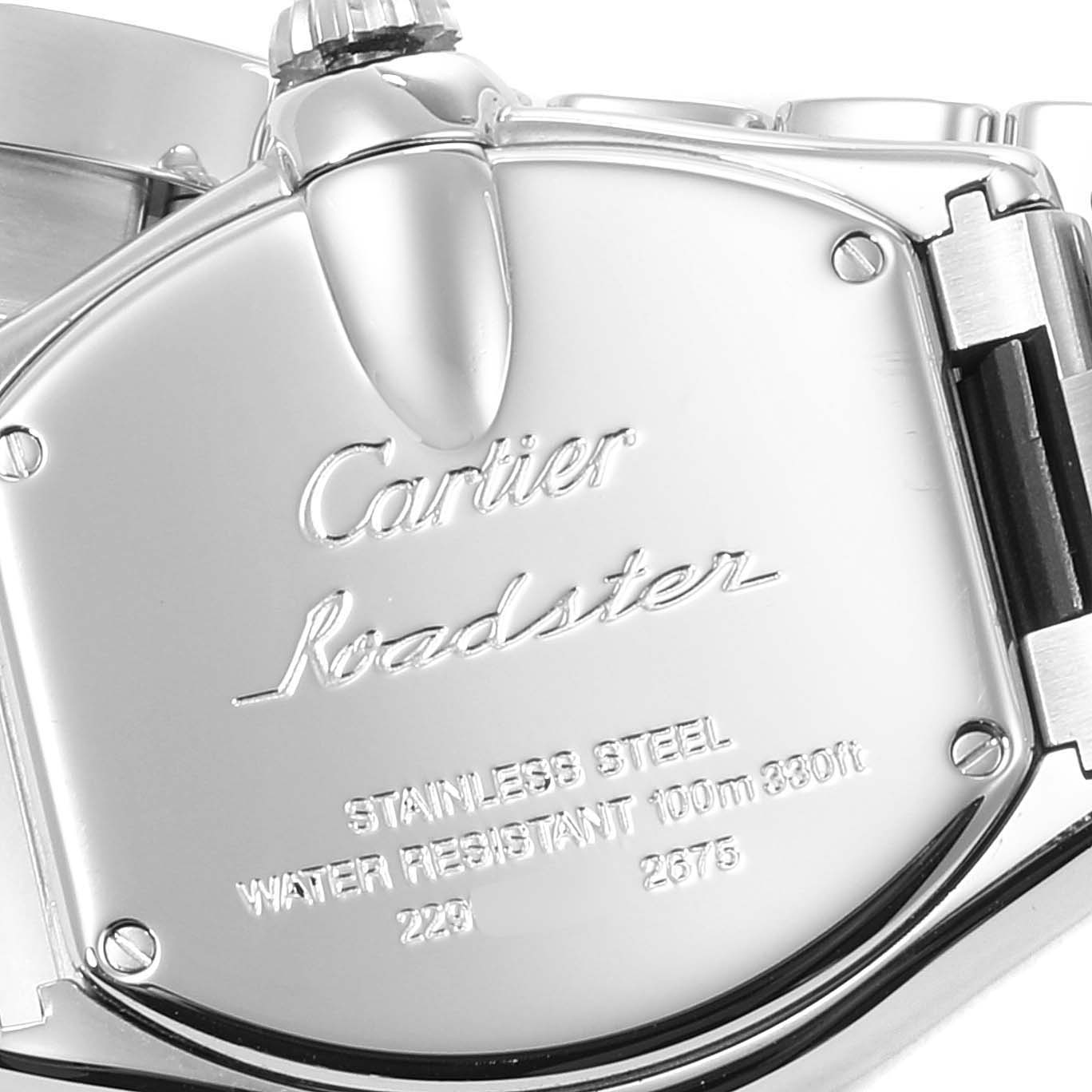 The image shows the back case of a Cartier Roadster W62016V3 Women's Stainless Steel Silver Dial W62016V3 Women's Stainless Steel Silver Dial watch with engraving details and part of the bracelet.