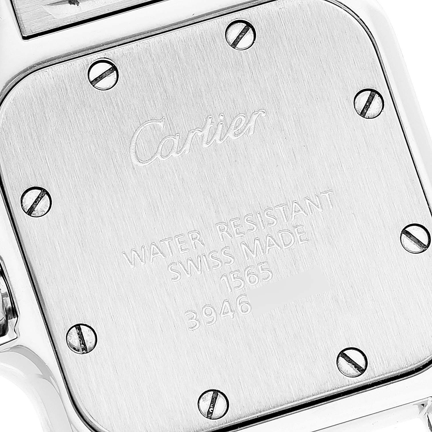 This image shows the back case of a Cartier Santos W20056D6 Women's Stainless Steel Silver Dial W20056D6 Women's Stainless Steel Silver Dial model watch, engraved with "Cartier" and technical details.